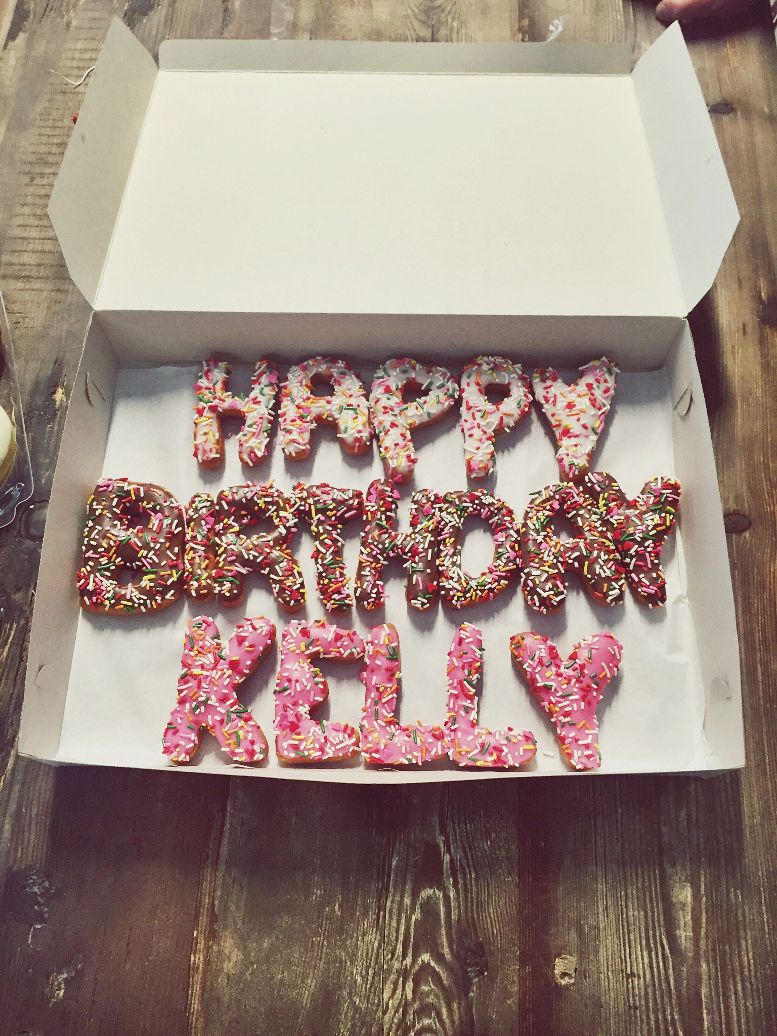 high angle view of alphabet birthday cake
