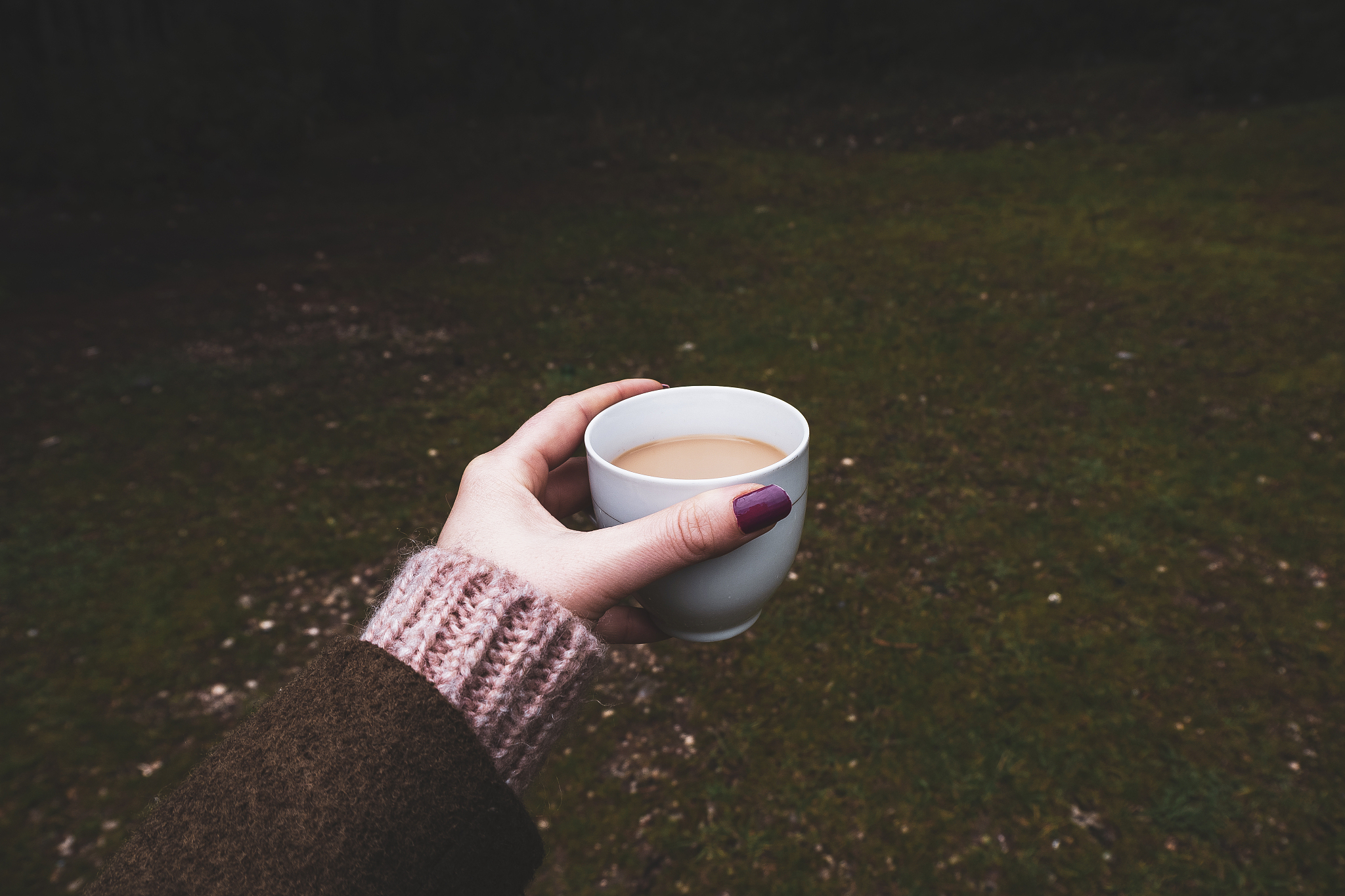 hand holding coffee