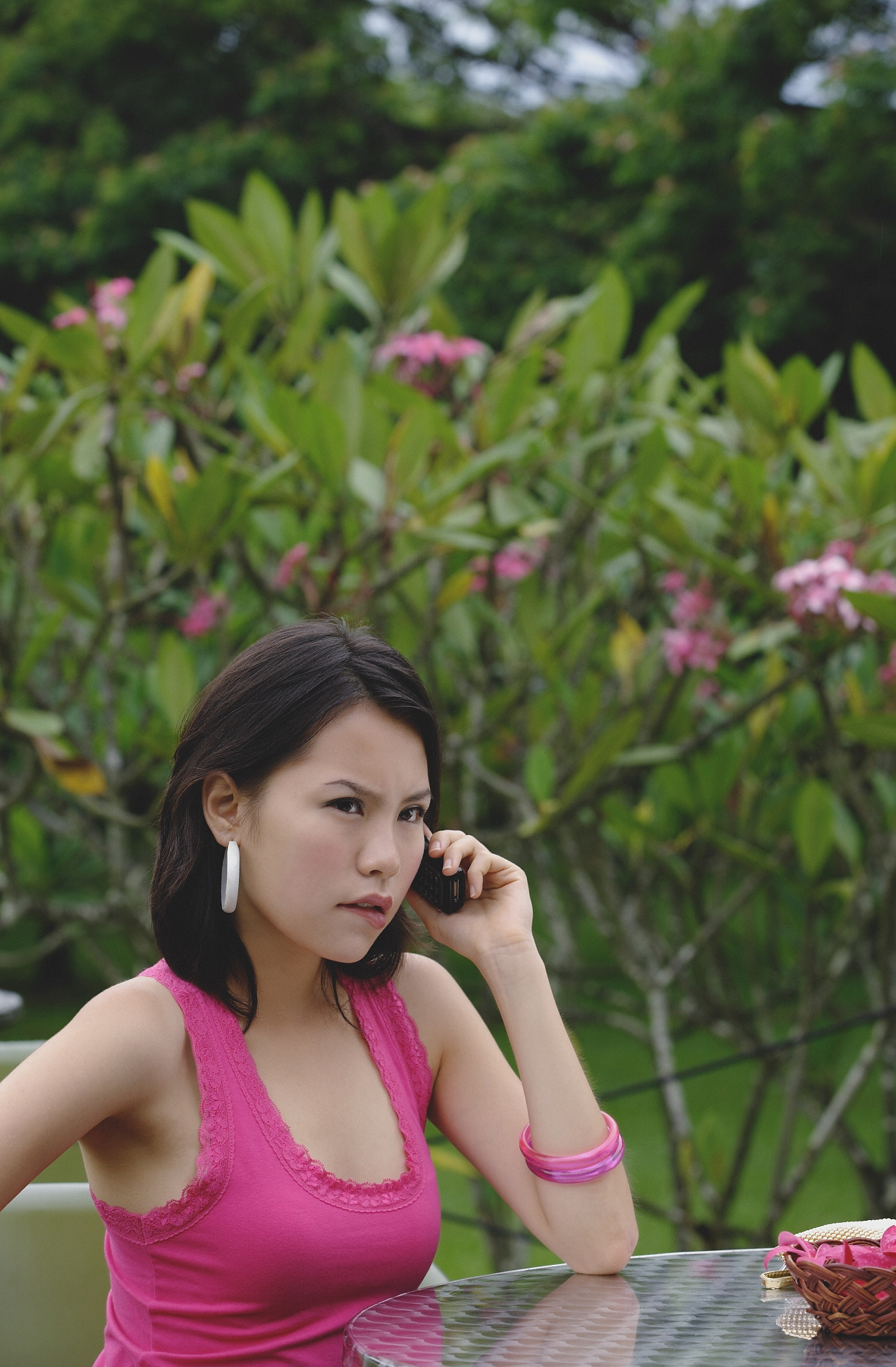young woman the phone,angry expression on face