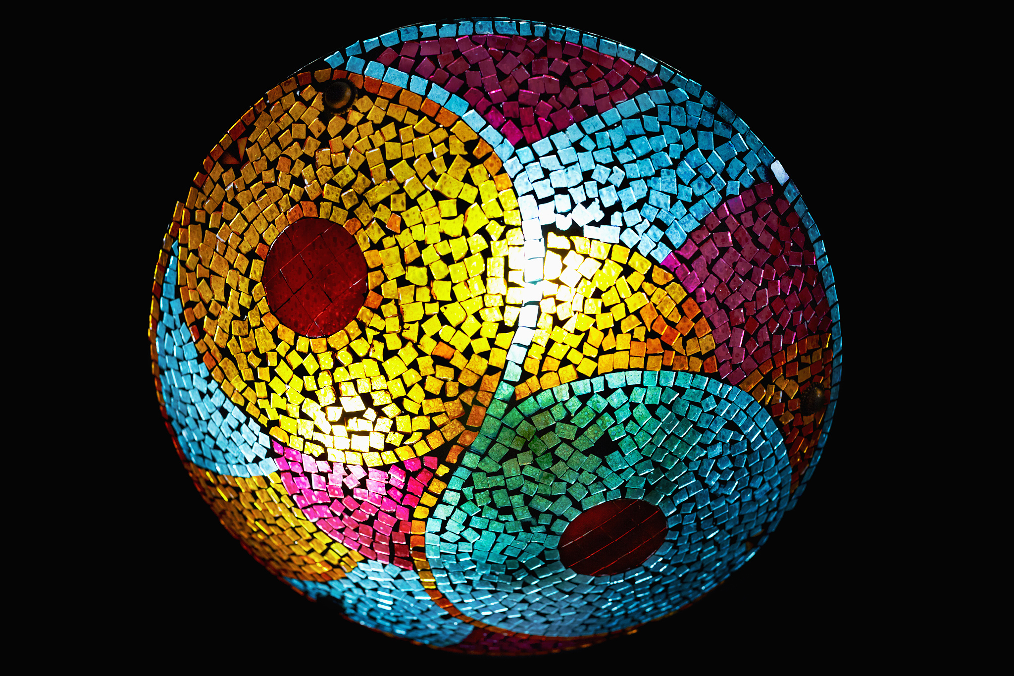 lit mosaic lamp in the dark
