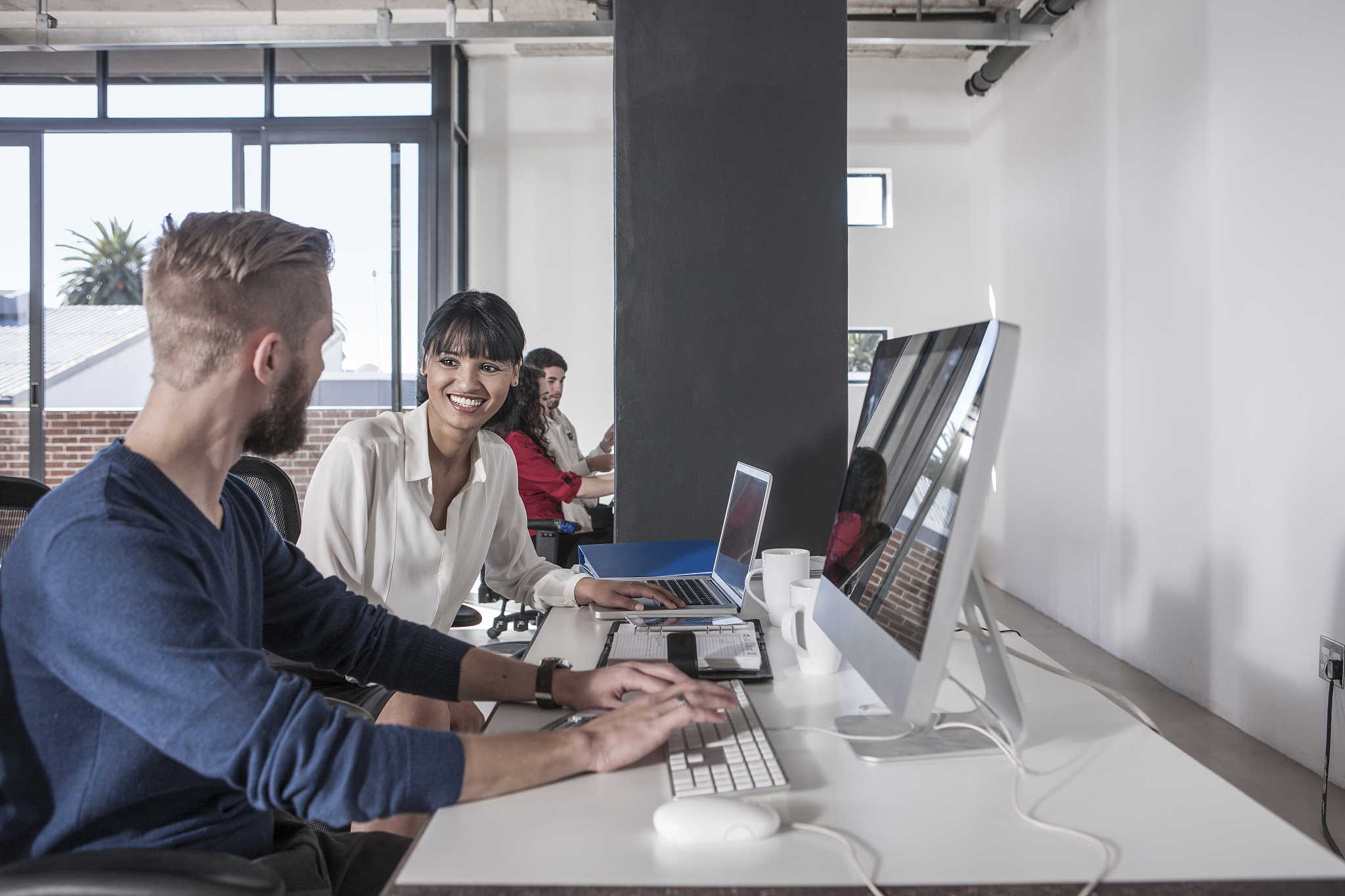 creative professionals working together in office