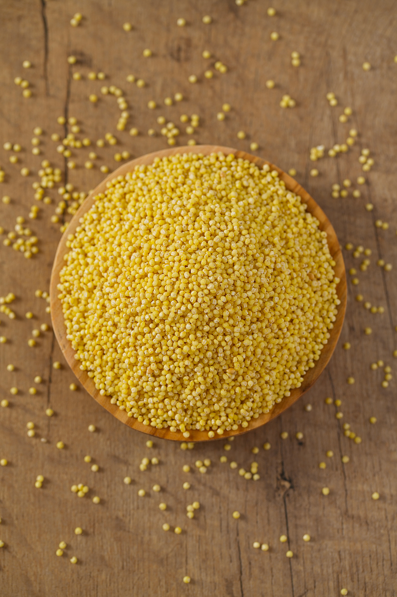 millet on wooden surface