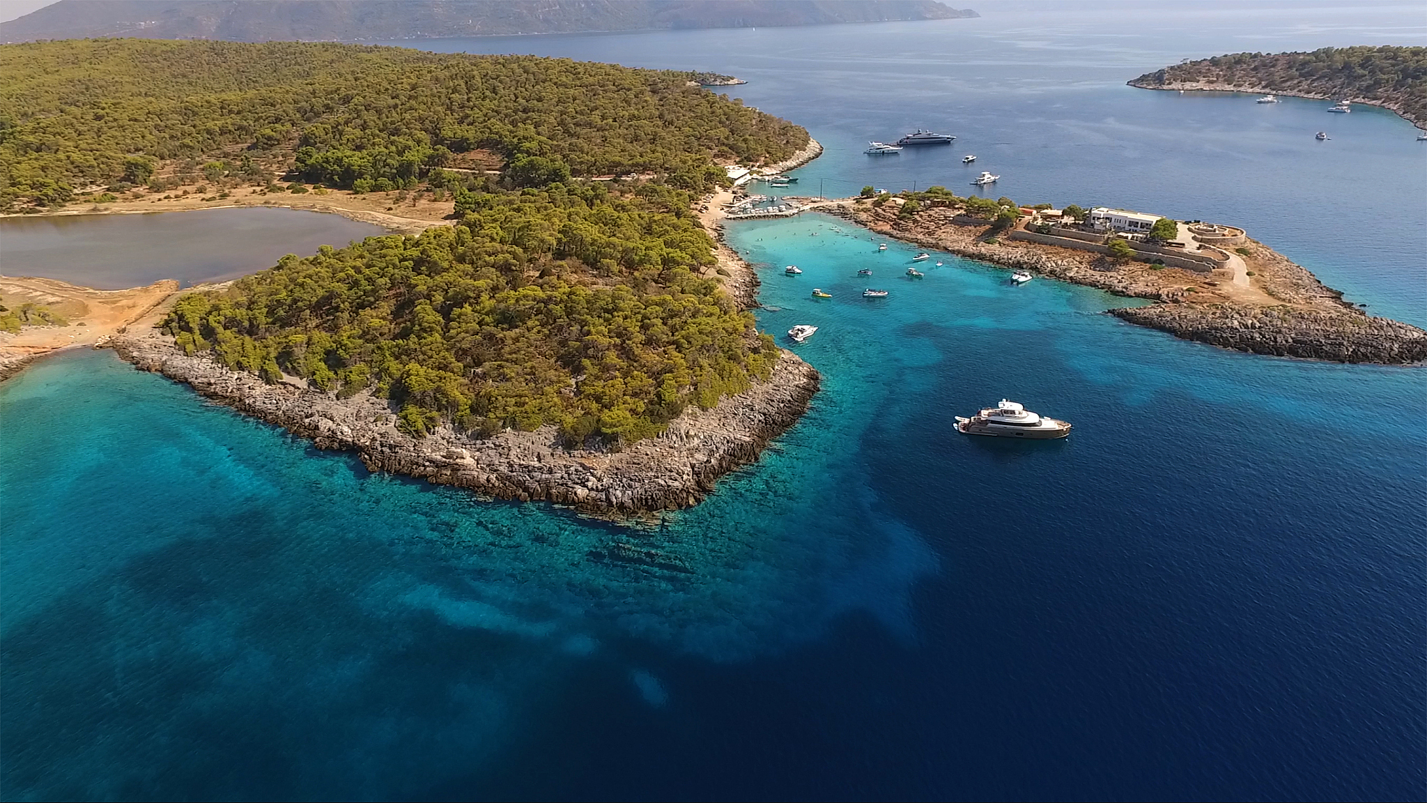 aerial drone photo of agistri island with clear water beaches, s