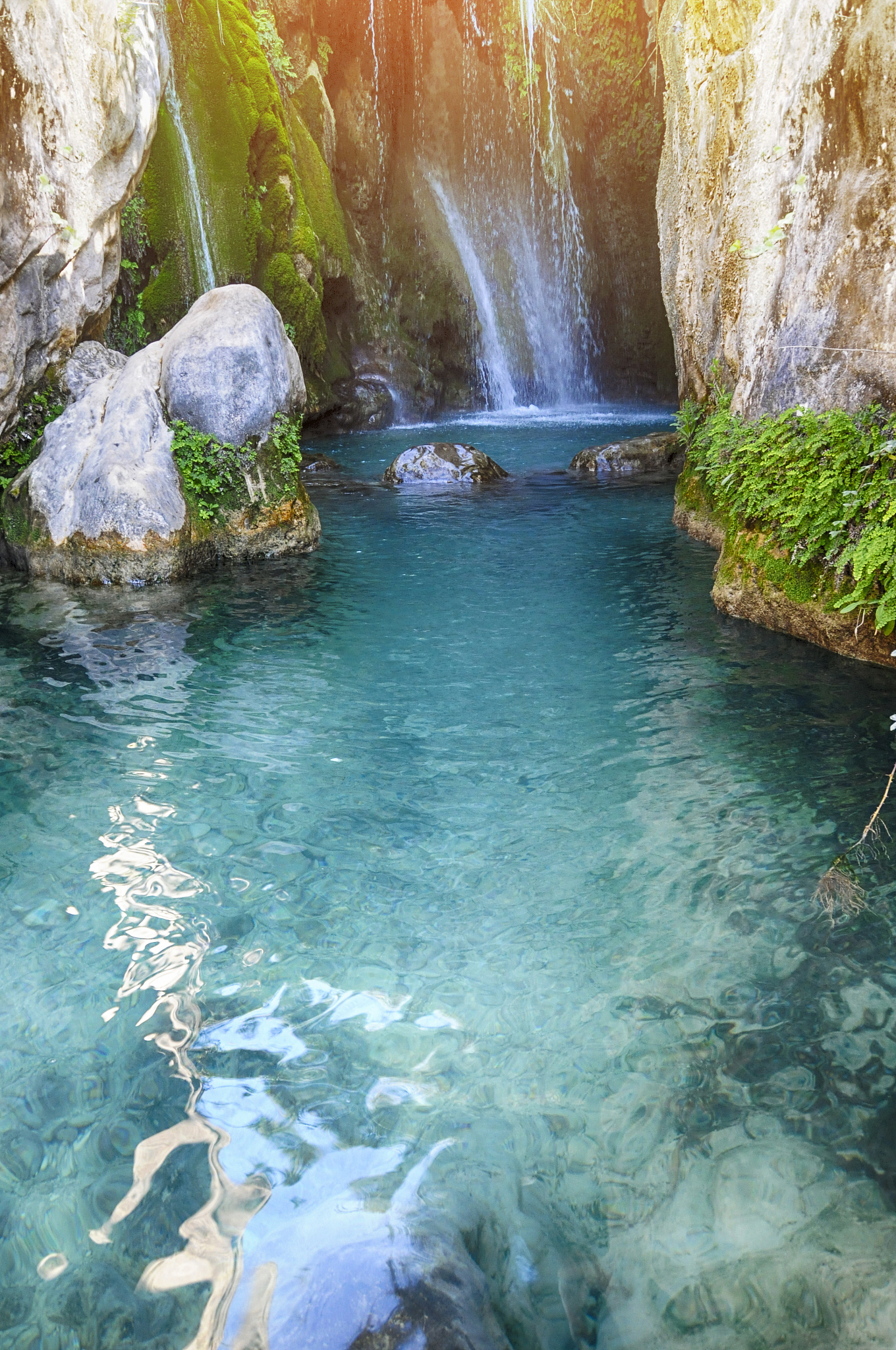 waterfall with green water pond, las fuentes del algar, alicante