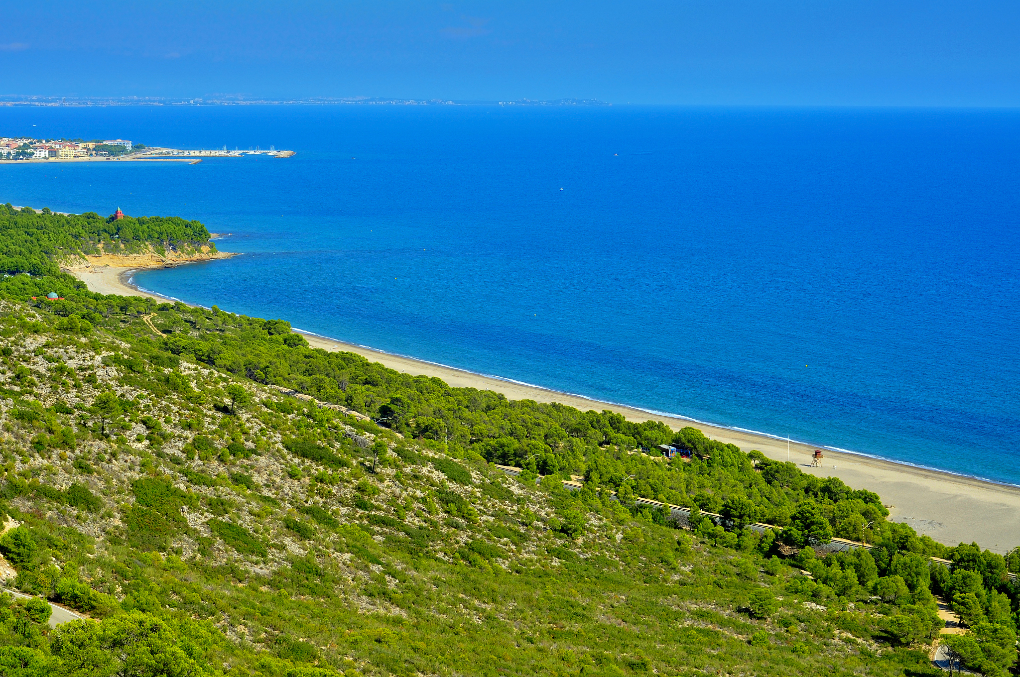 torn beach and the coast of hospitalet del infant, spain