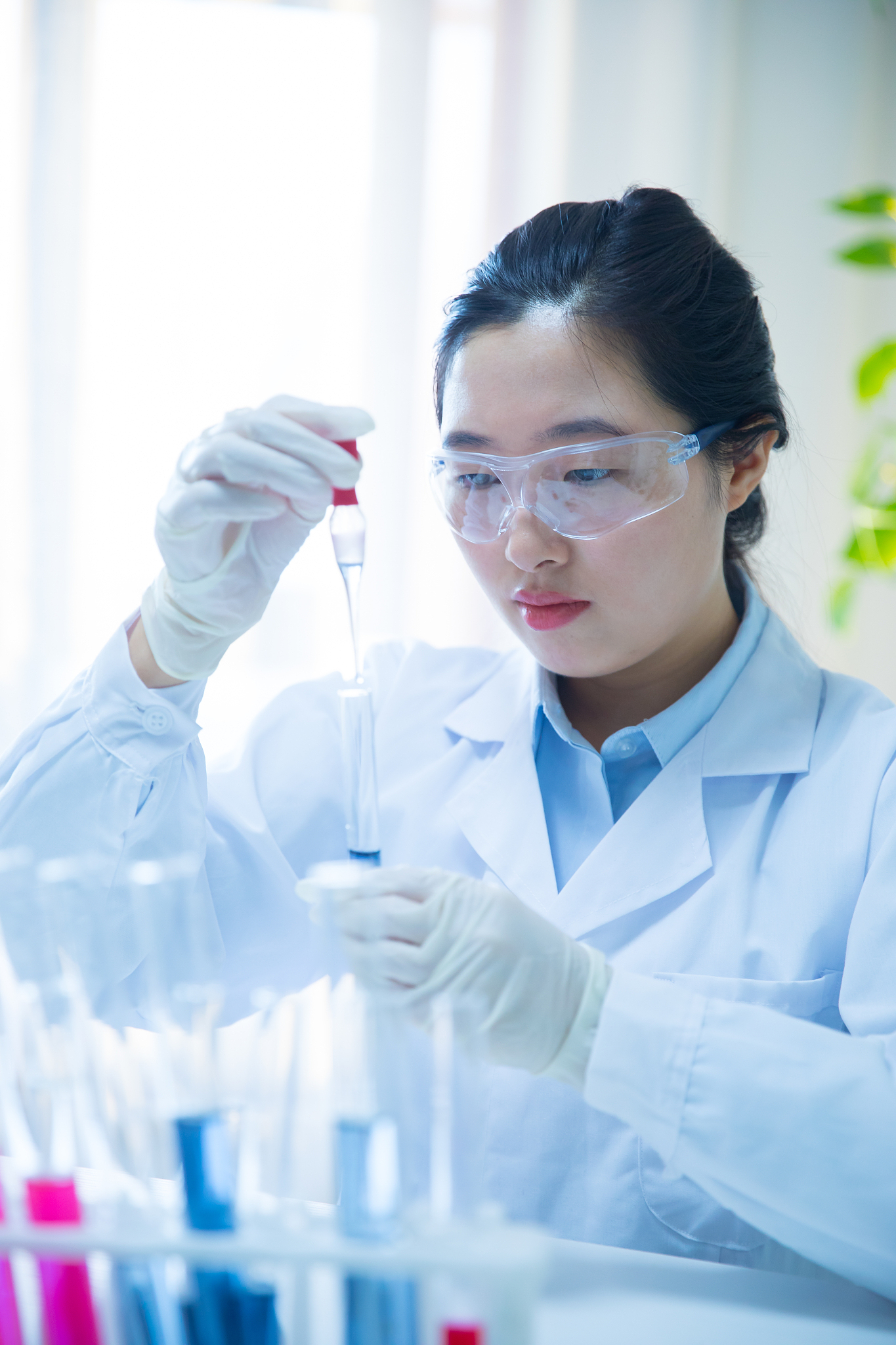 scientists working with test tube