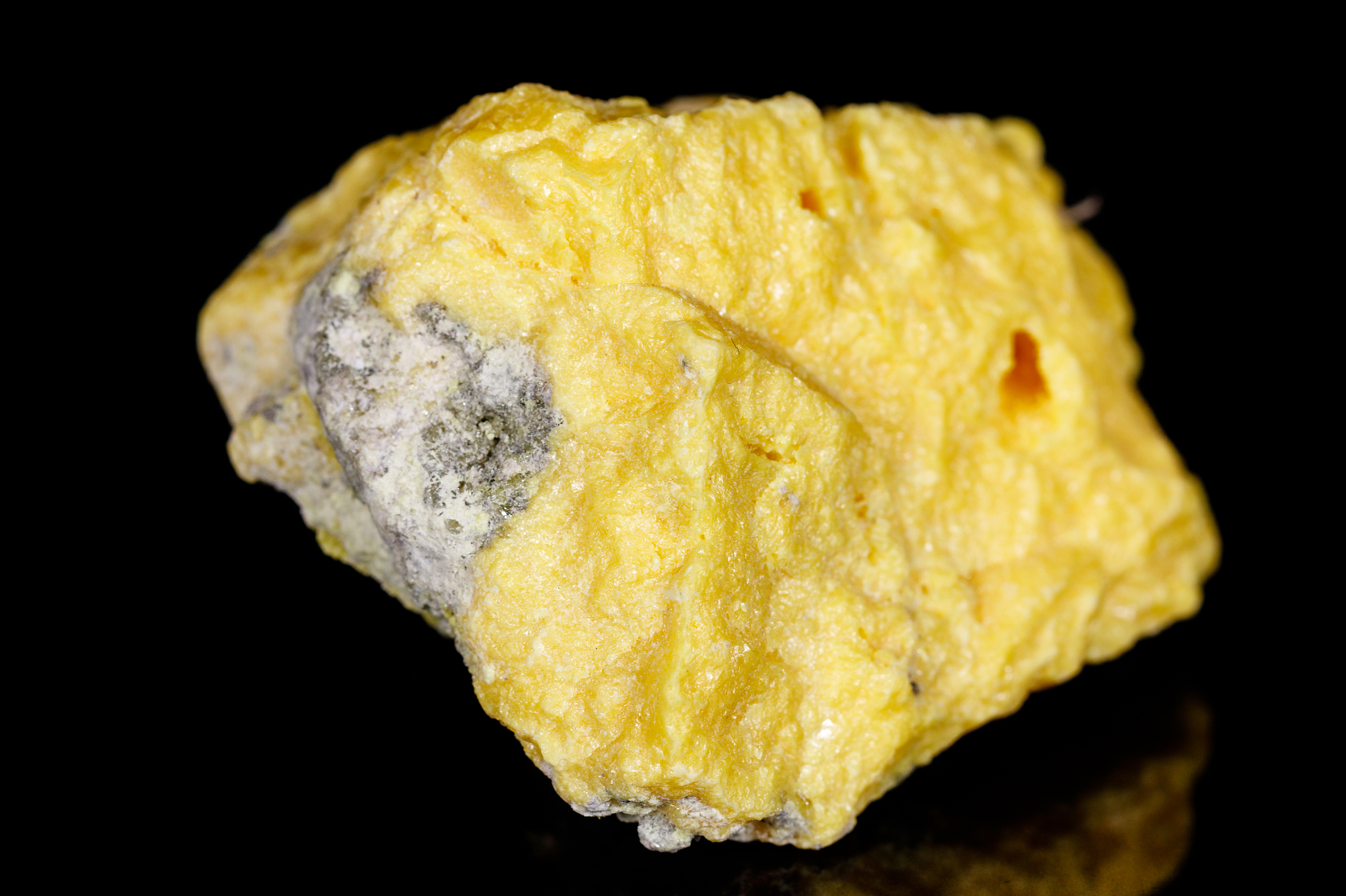 macro mineral stone sulfur on black background