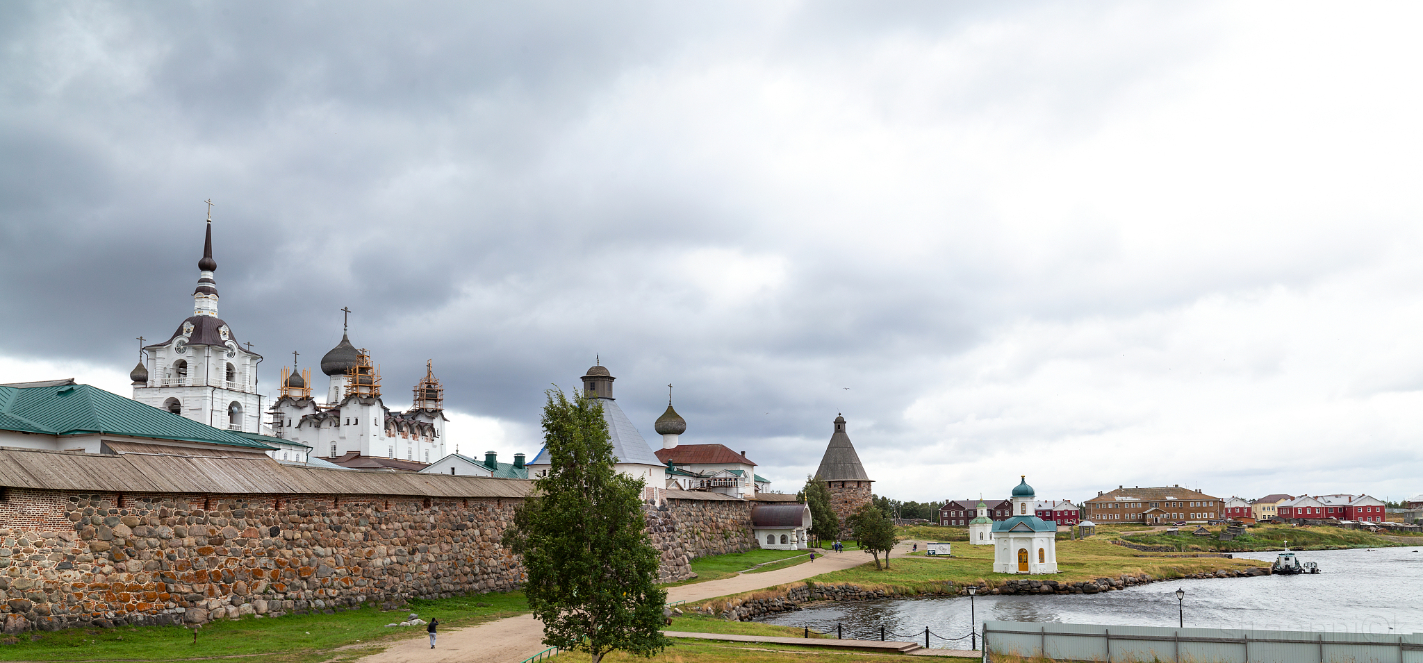 panorama of the solovetsky monastery and sea bay in nasty summer