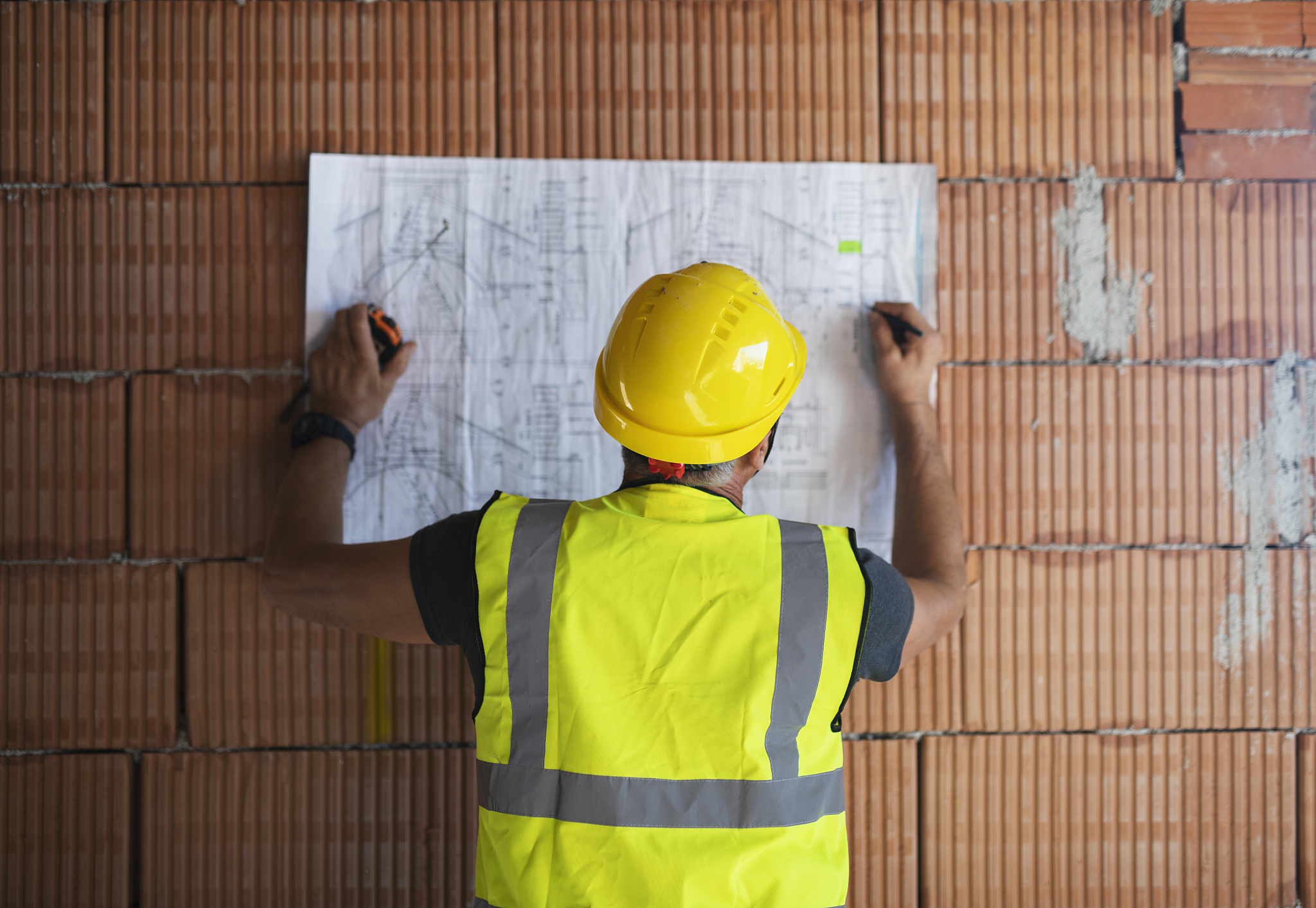 confident construction architect on construction site