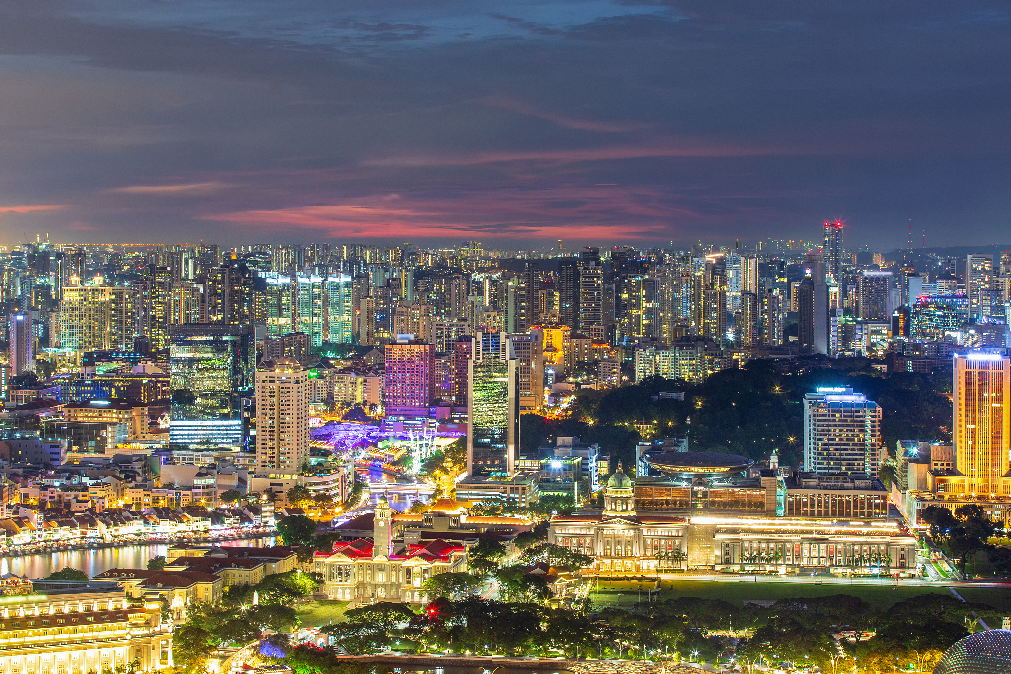 business building and financial district in night time at singap