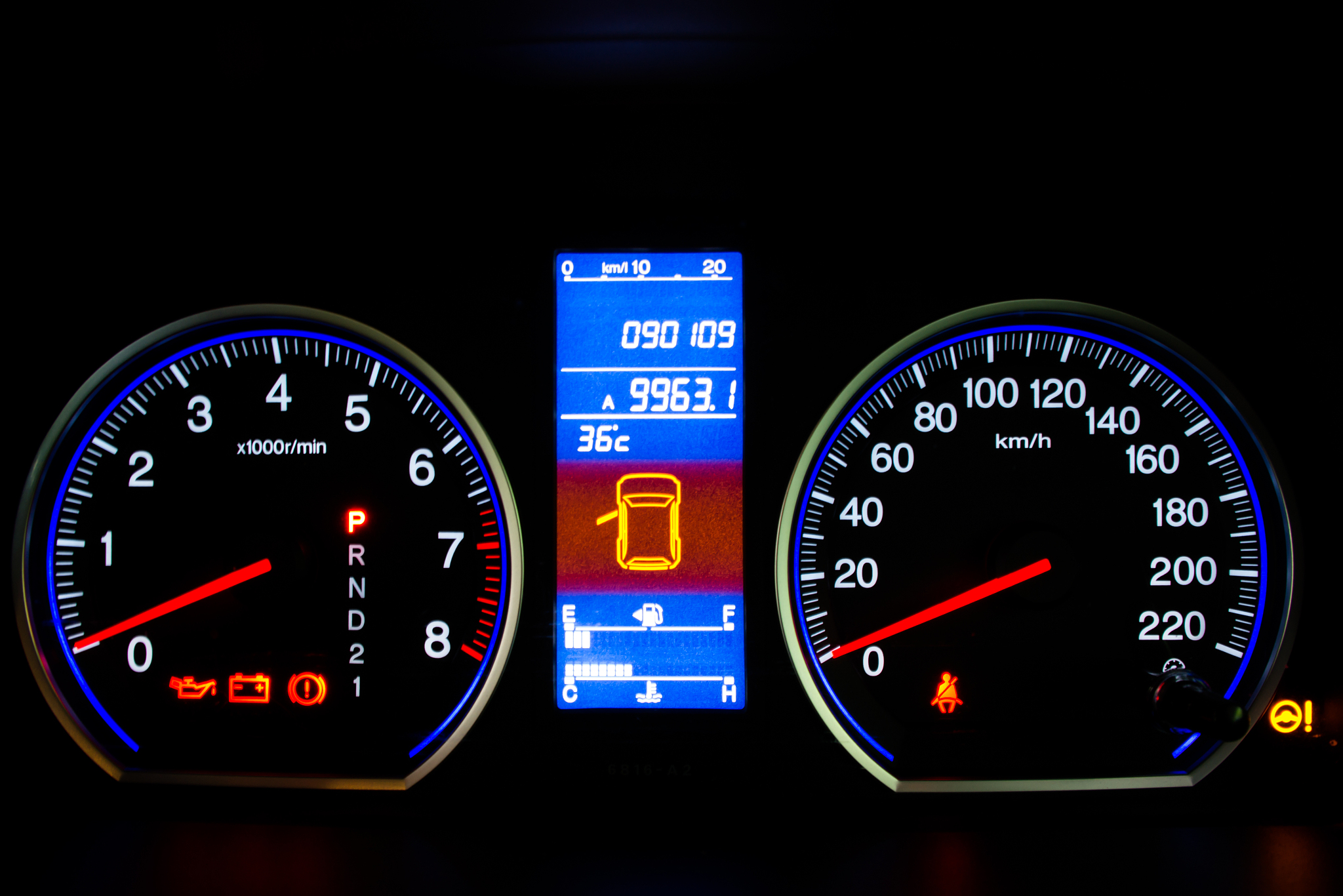 modern car speedometer and illuminated dashboard