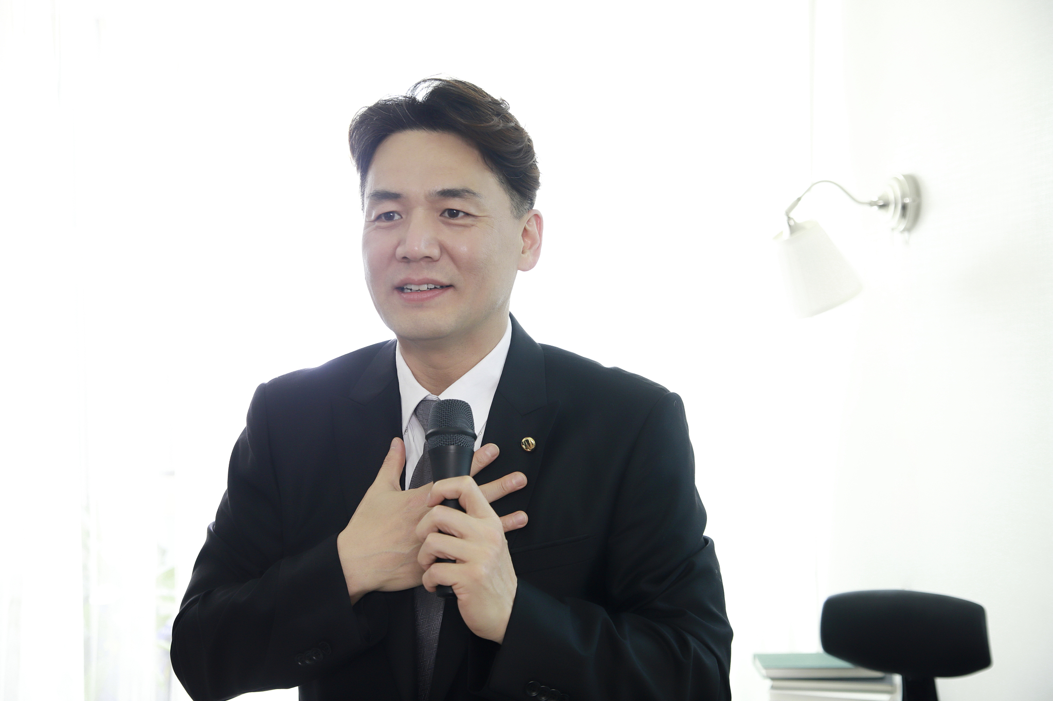 lawyer talking with microphone