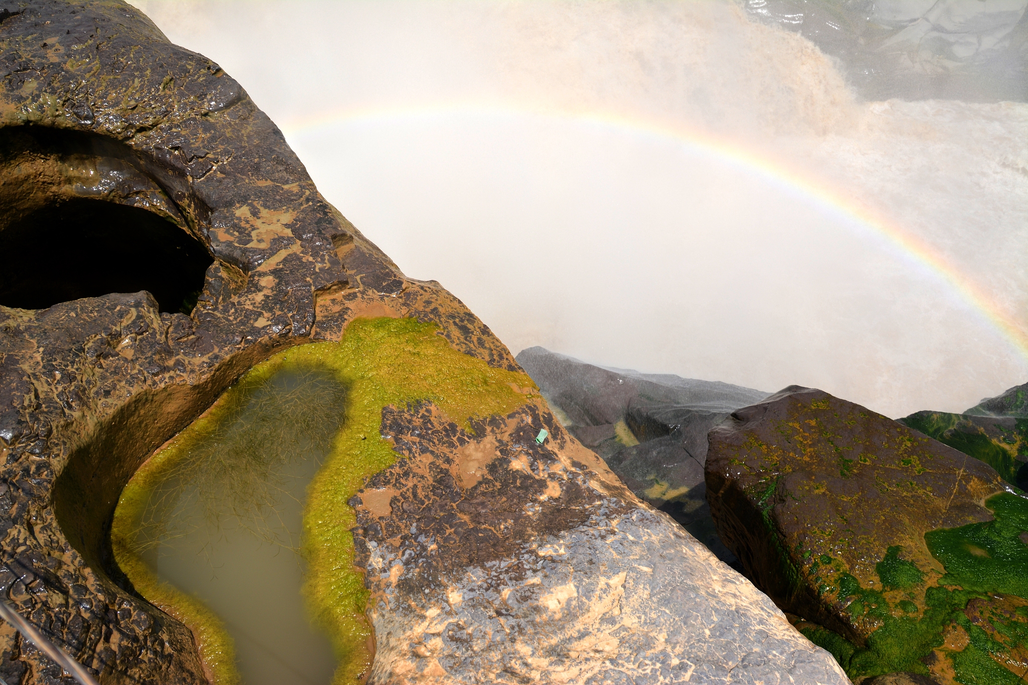 rainbow at hukou waterfall, shaanxi, china