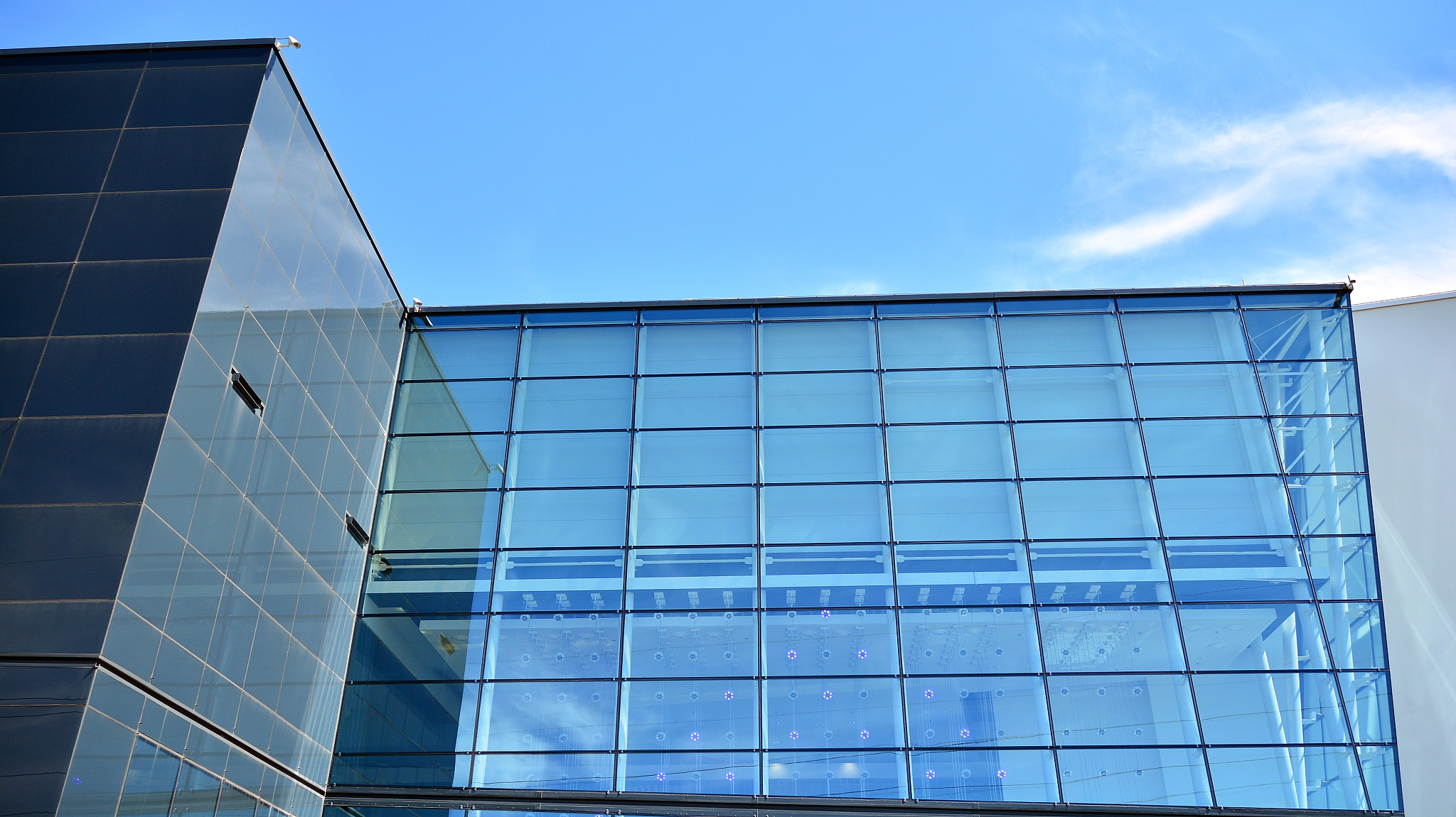 commercial building close up. abstract texture of blue glass mod