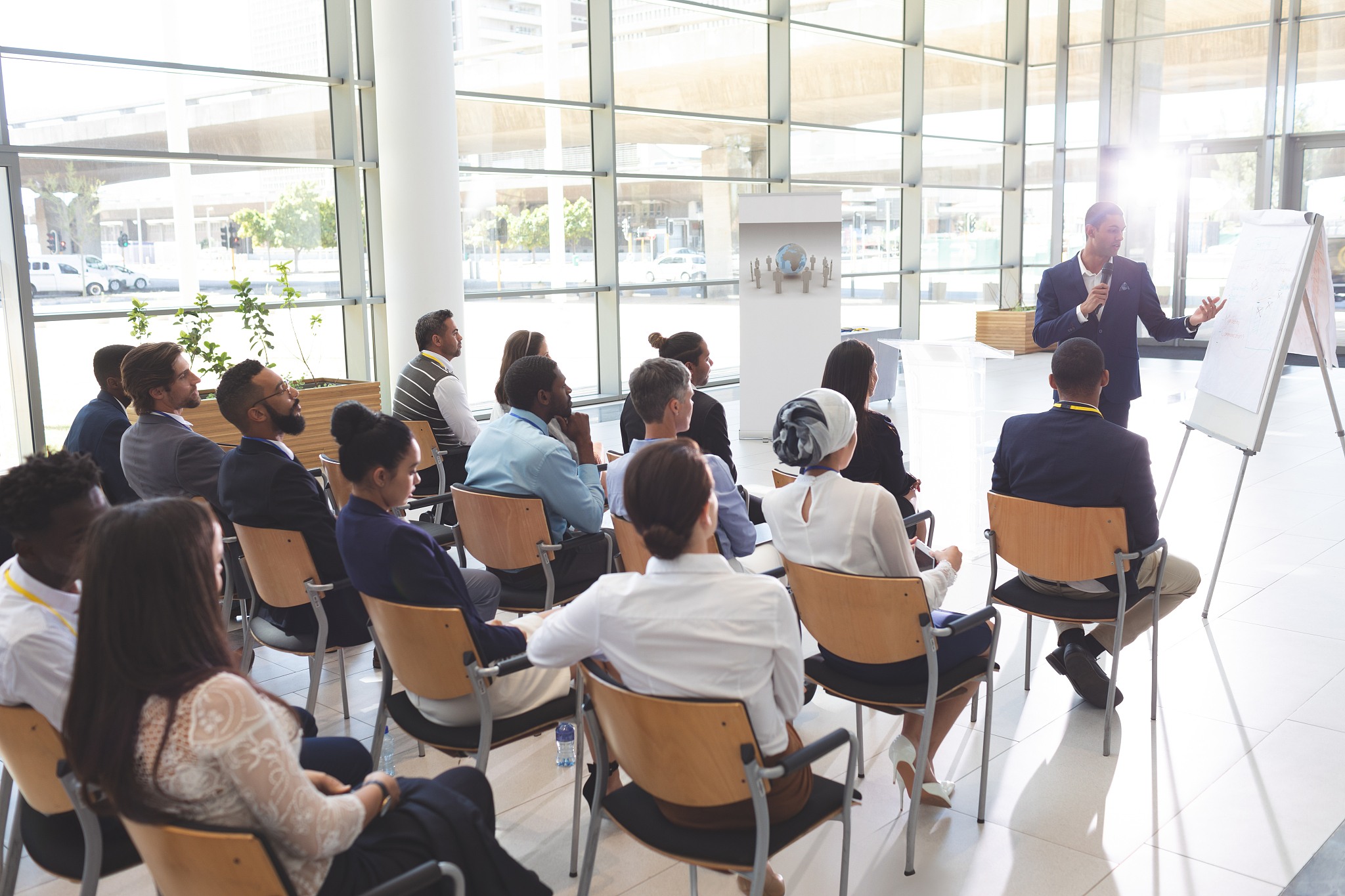 male speaker speaking in a business seminar