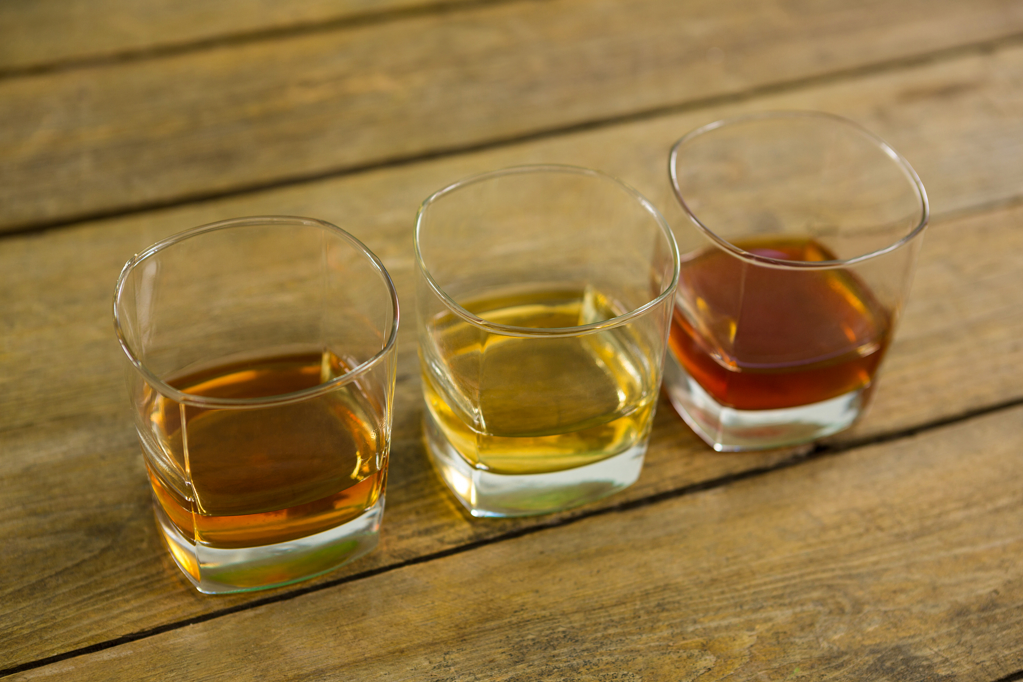 three glasses of whiskey