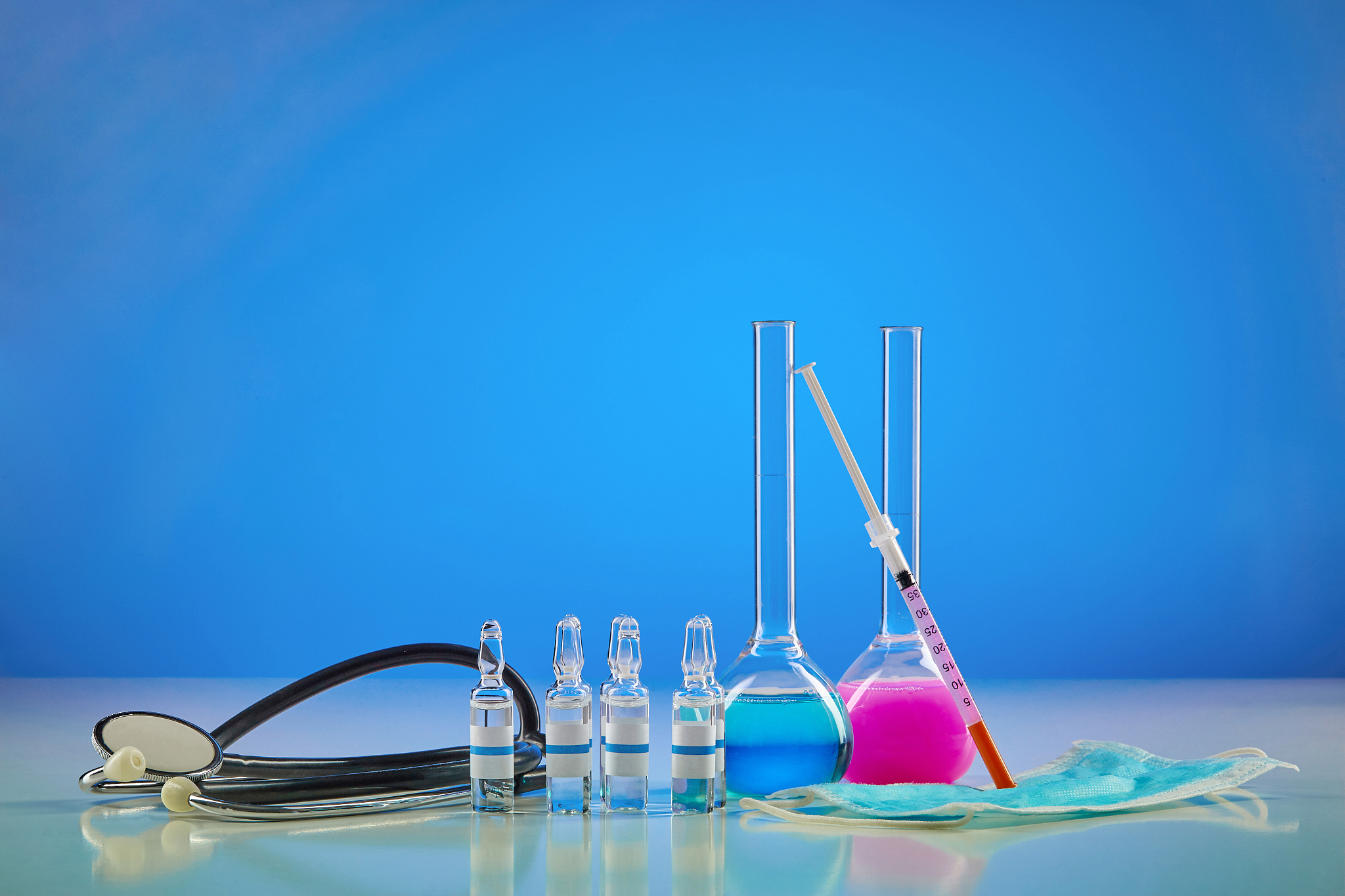 medical flasks with colorful chemical reagents. six ampoules wit