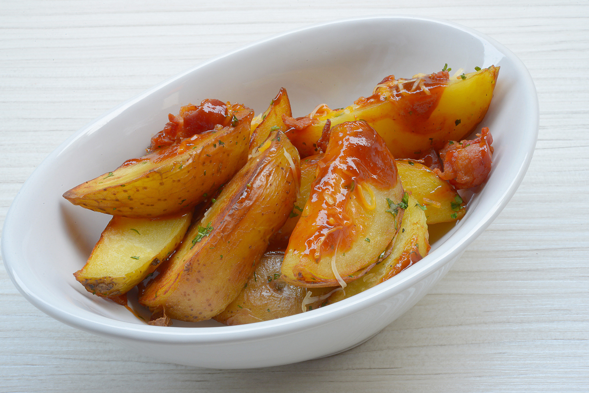 homemade potato chips with spices and herbs.