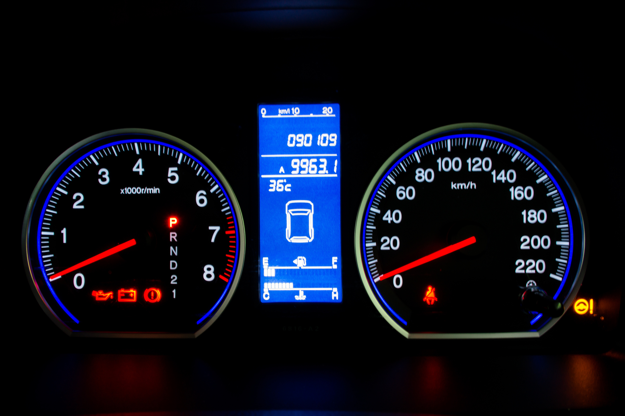 modern car speedometer and illuminated dashboard