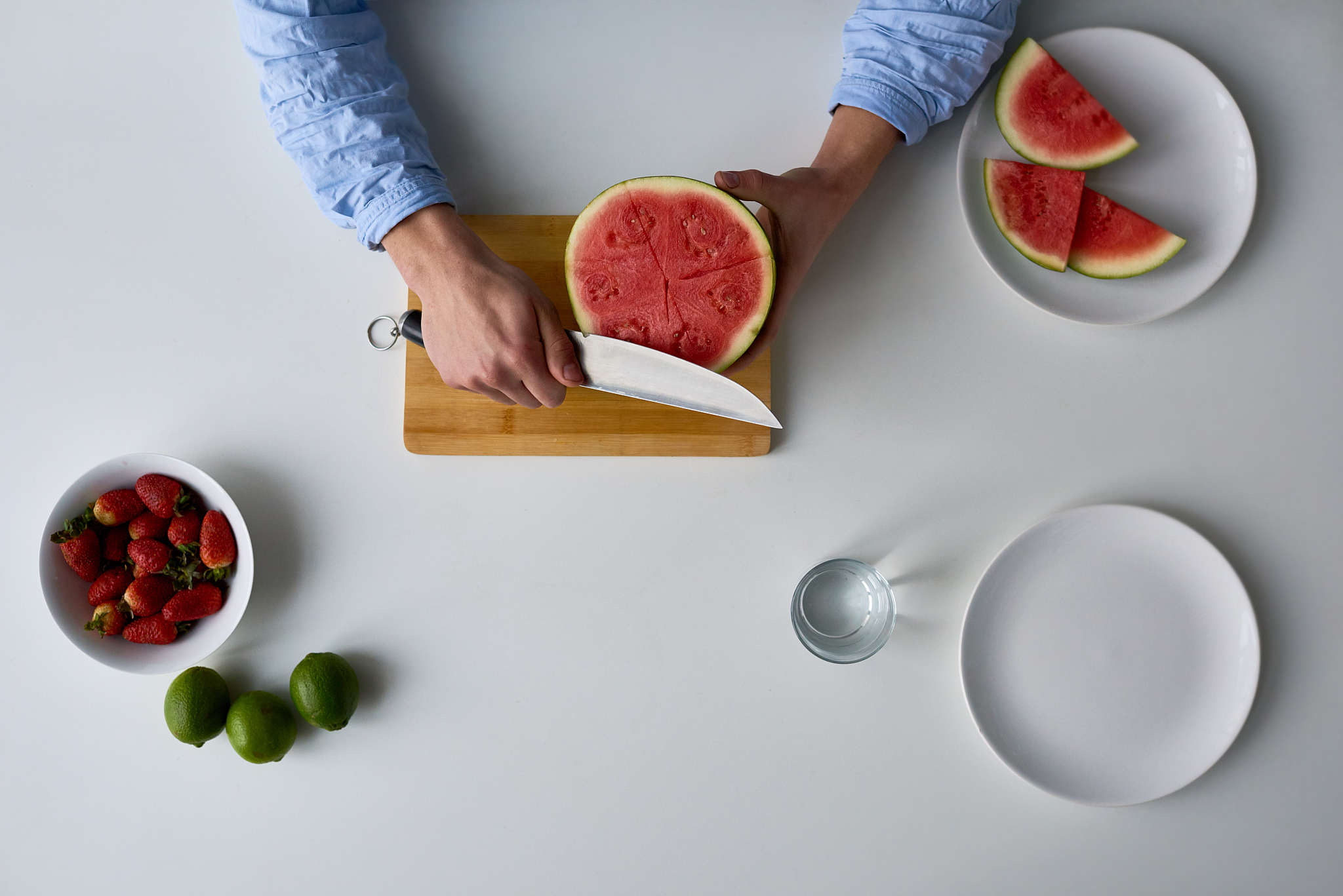 crop man cutting ripe watermelon