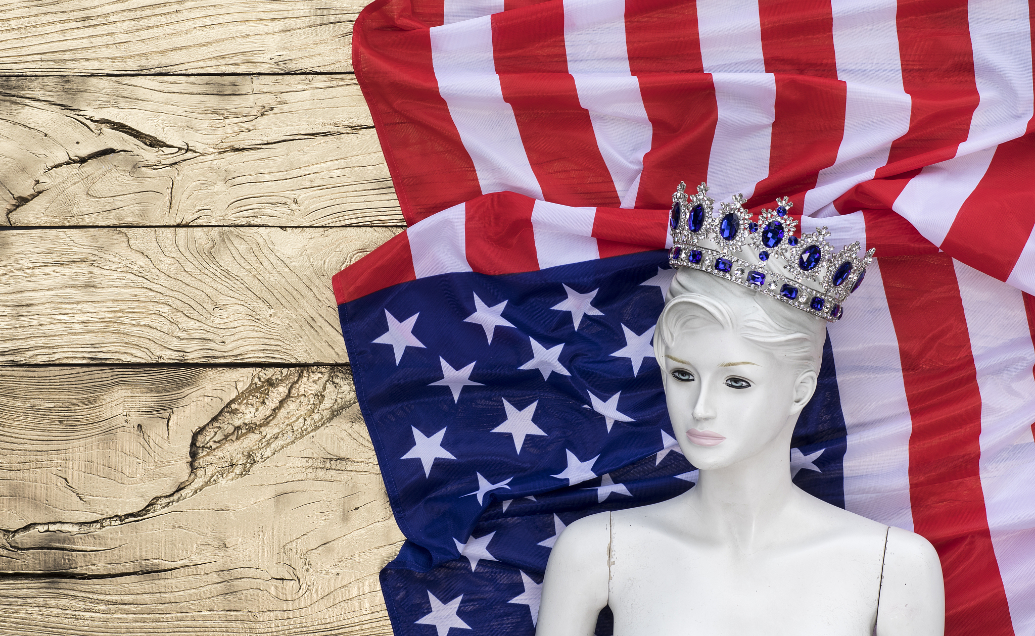 american flag and mannequin on a gold background