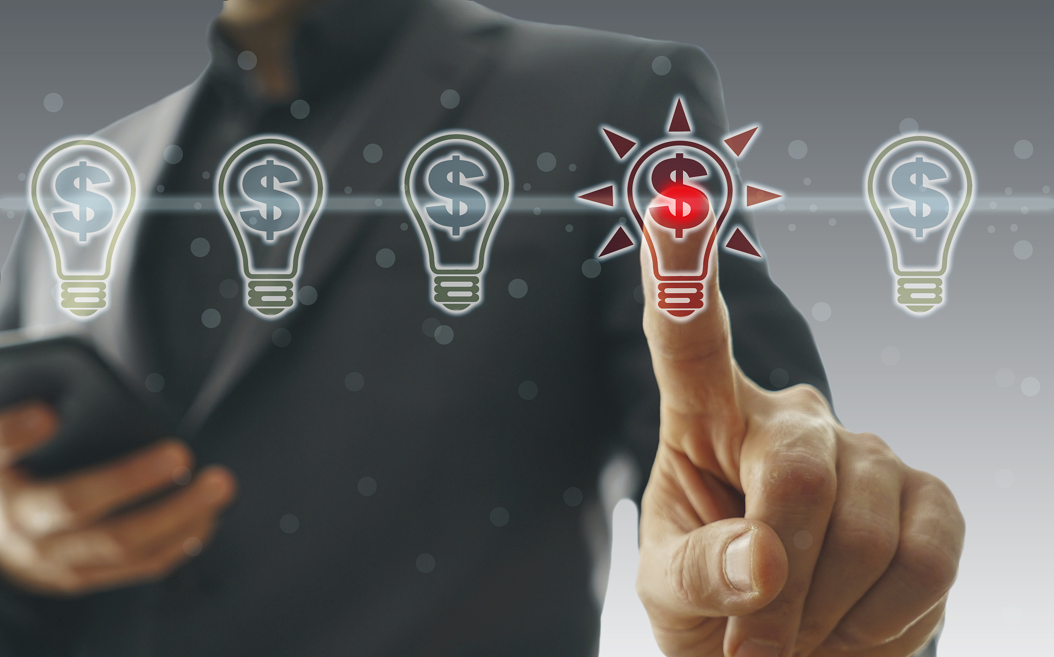 dollar concept with light bulbs on touch screen