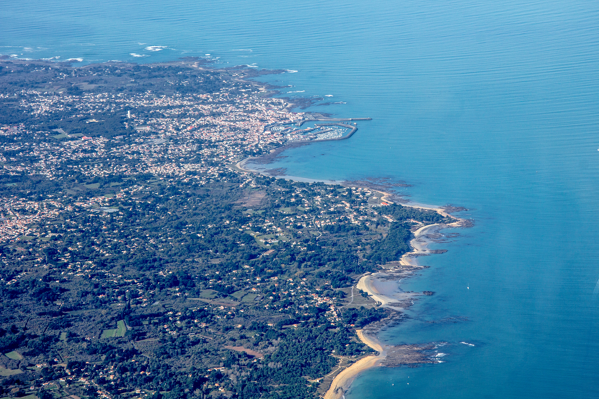 high angle view of sea and city