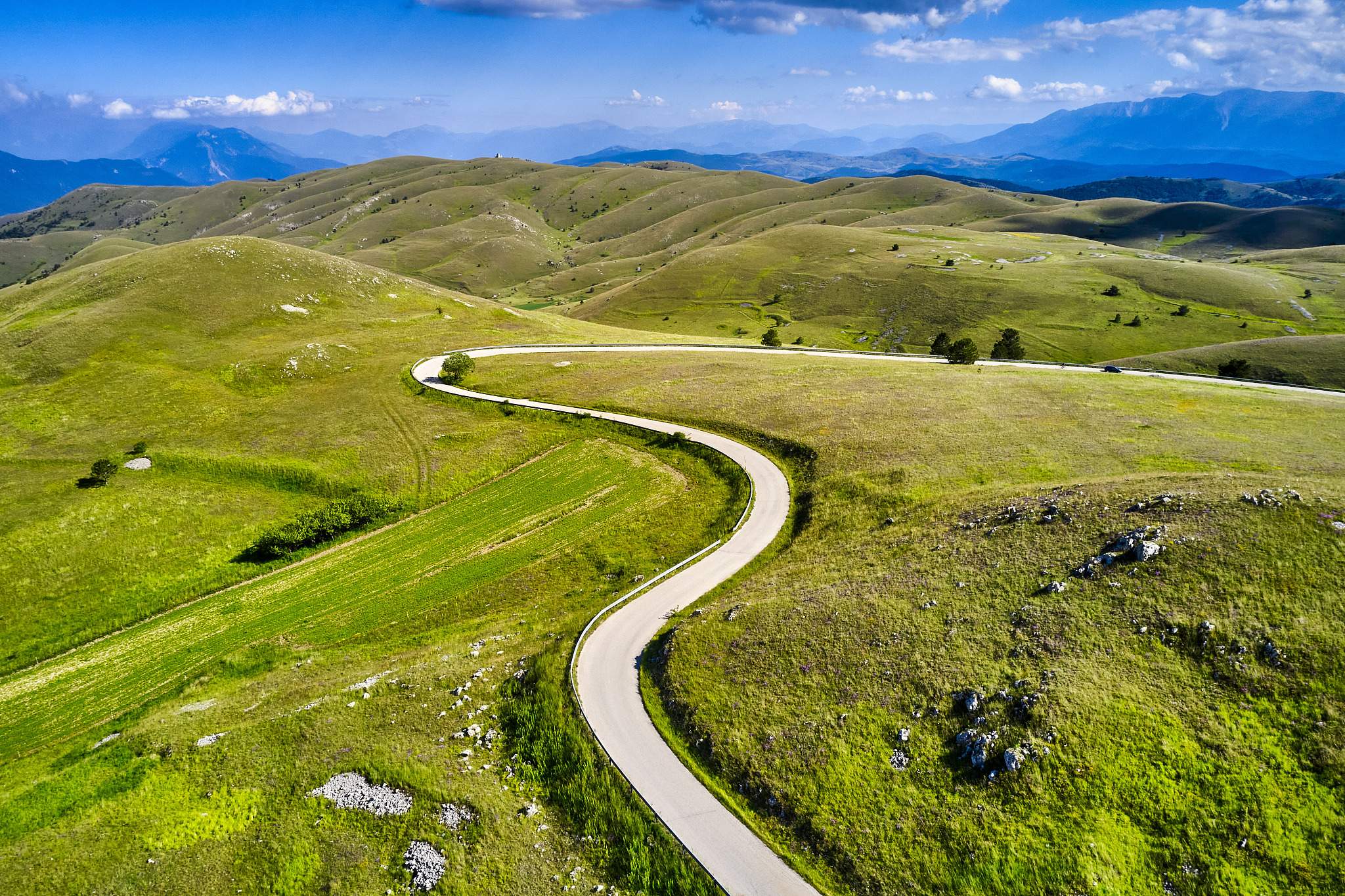 winding road in gran sasso national park, abruzzo, italy