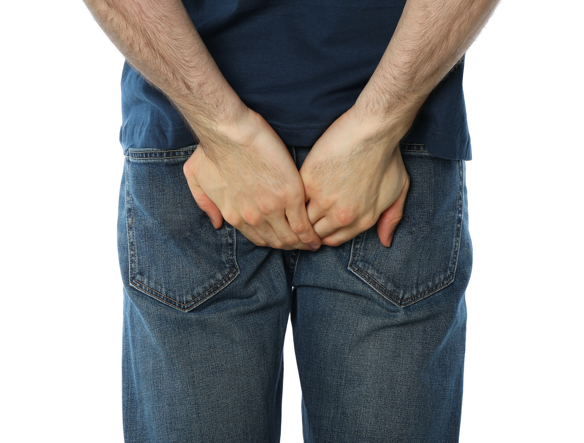 man holding his butt, isolated on white background