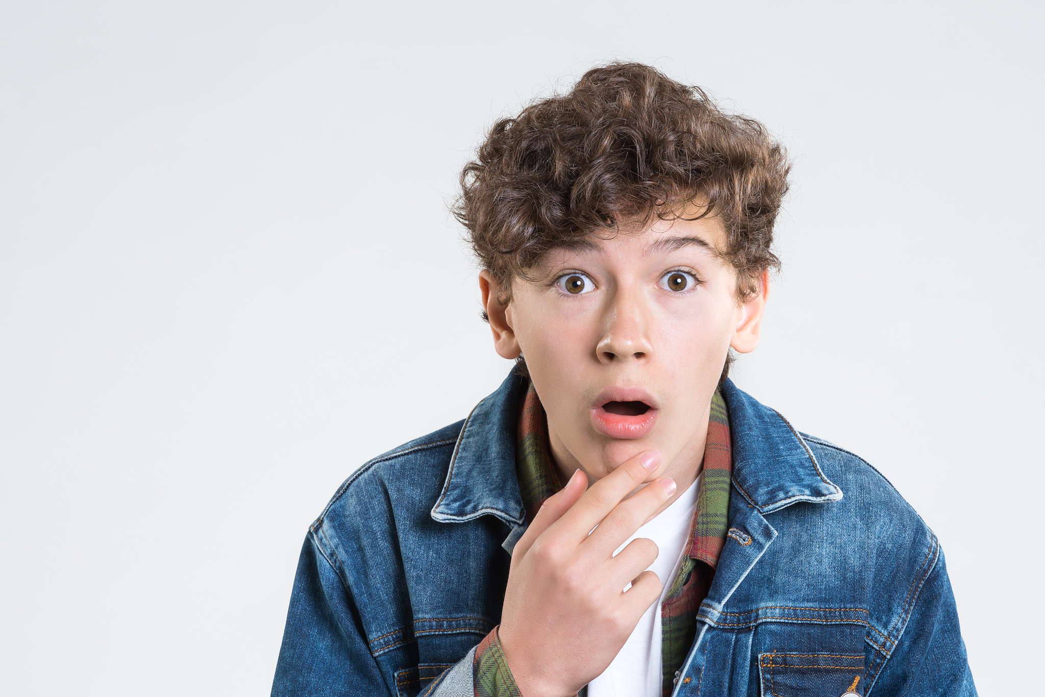 very surprised young boy