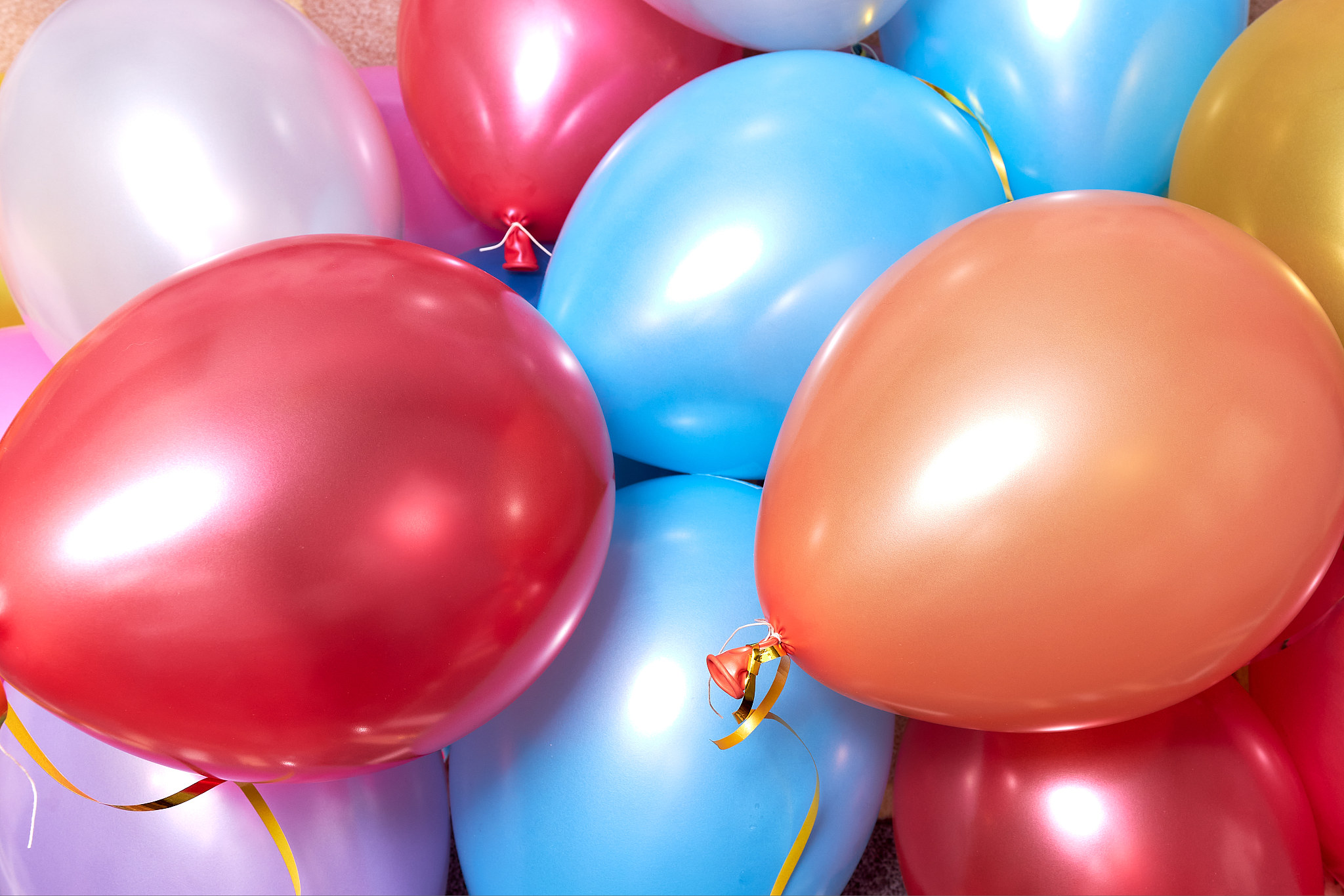 many colored balloons forming a bright background wallpaper imag