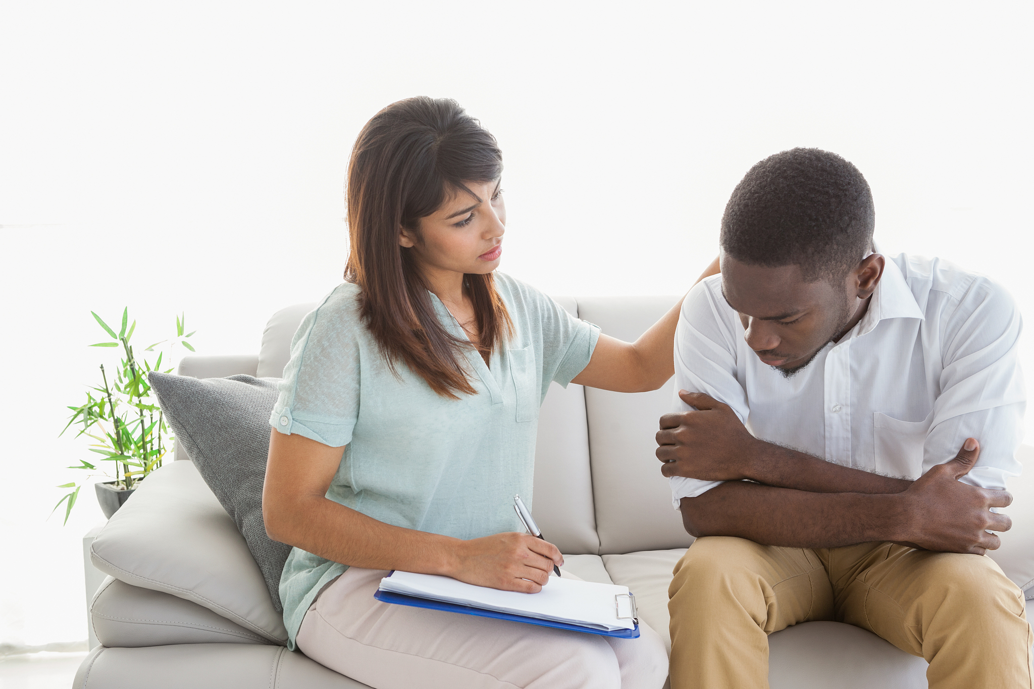 therapist reassuring her upset patient