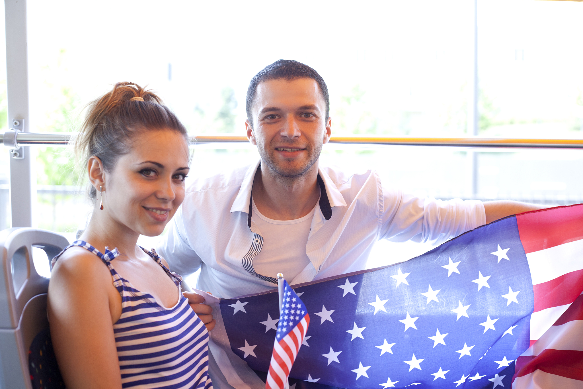 young couple with usa flag
