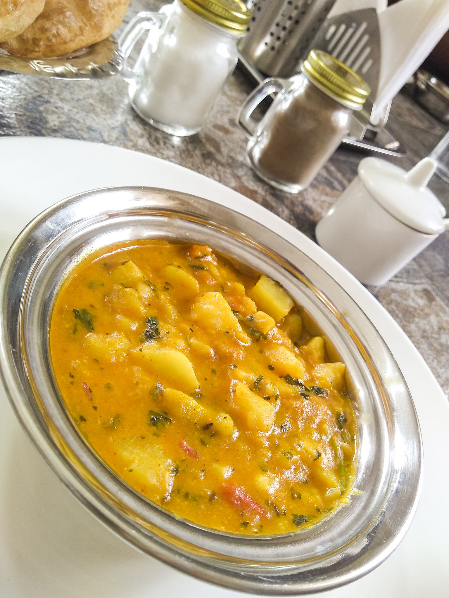 traditional indian food puri and bhaji.