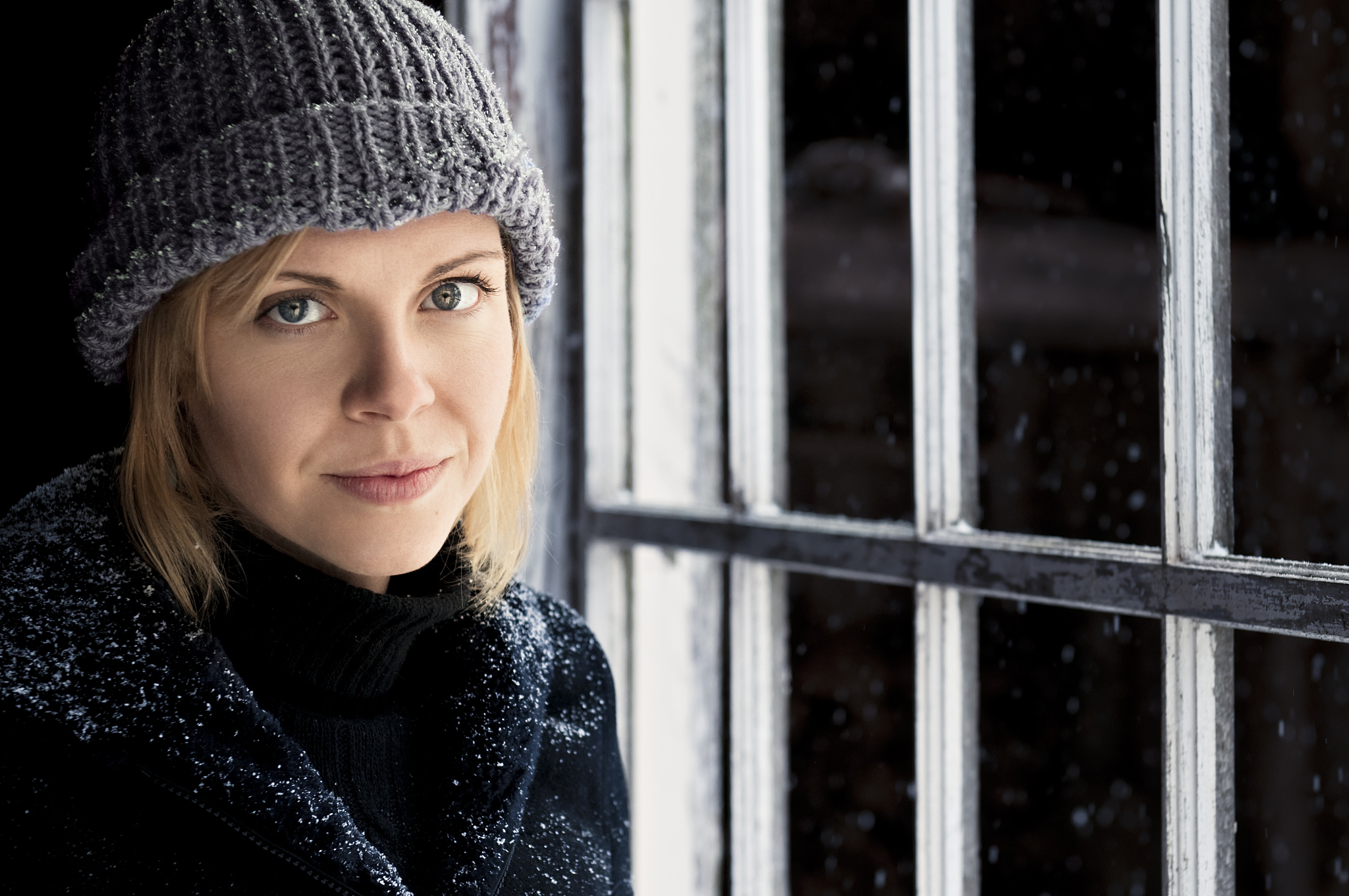 young attractive woman in the snow
