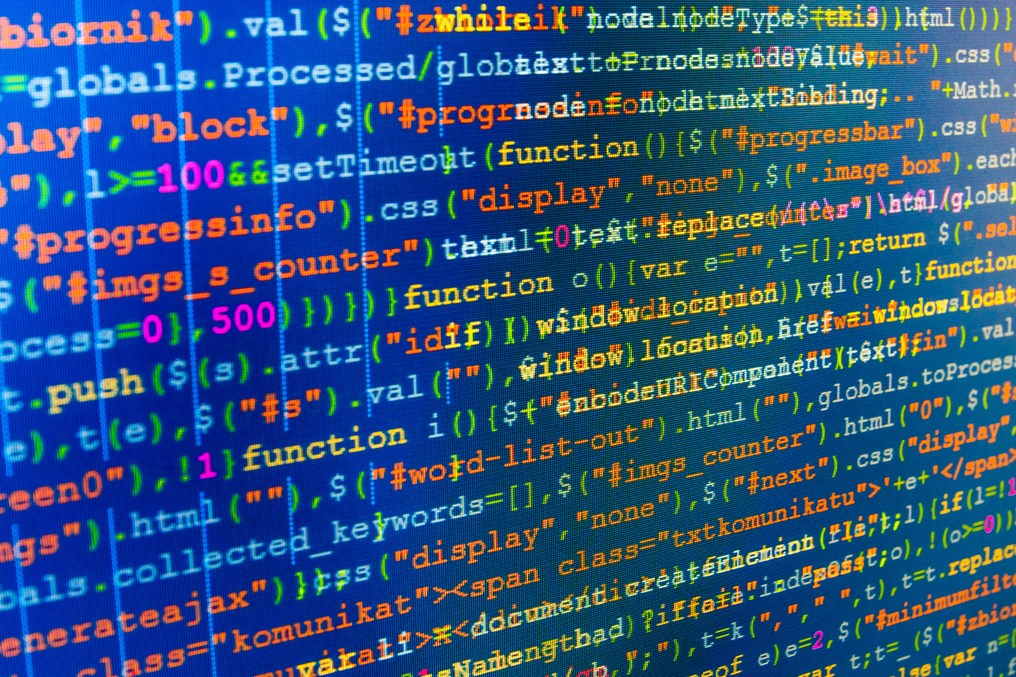 software developer programming code on computer