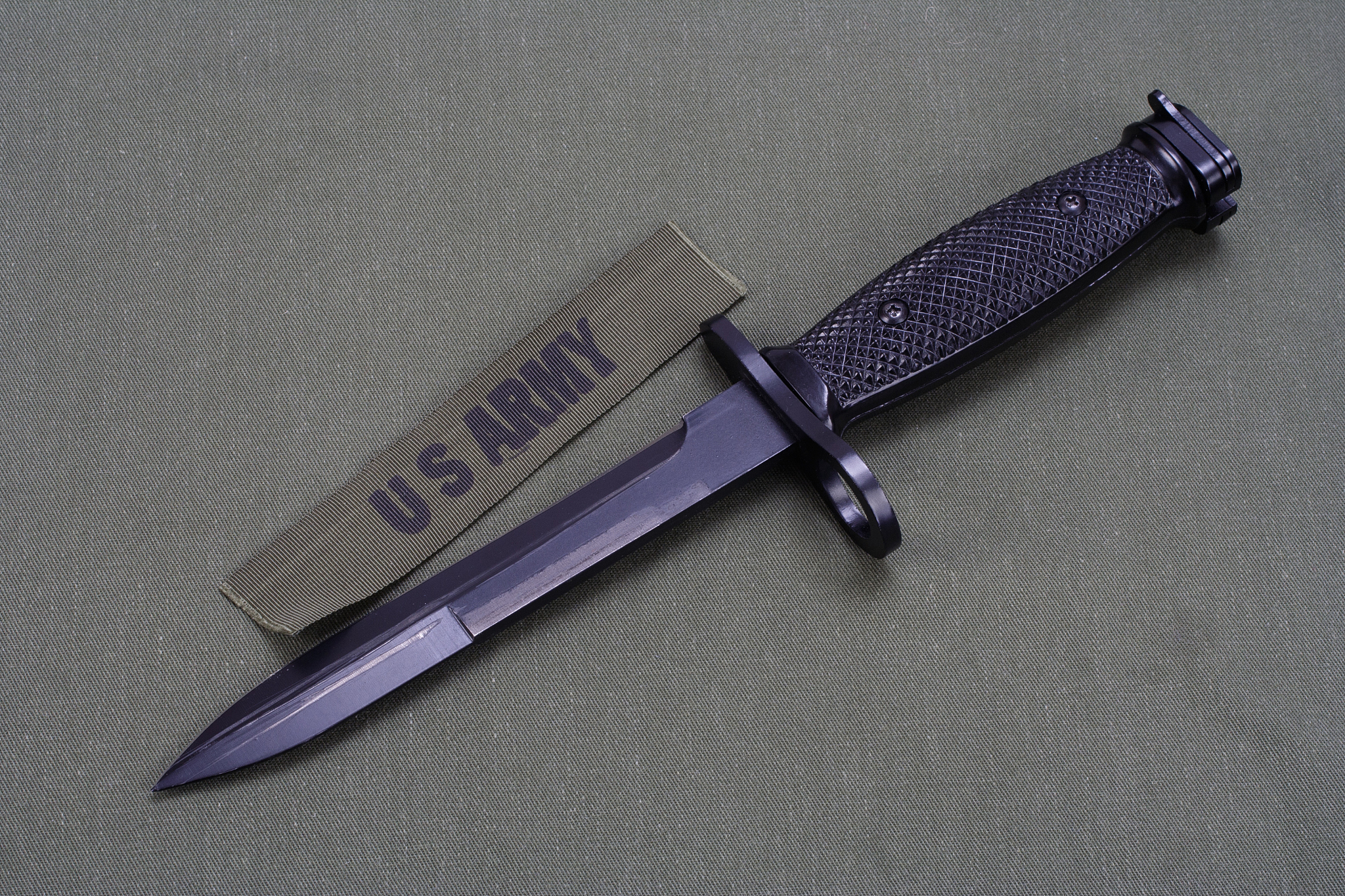 bayonet on us army uniform background