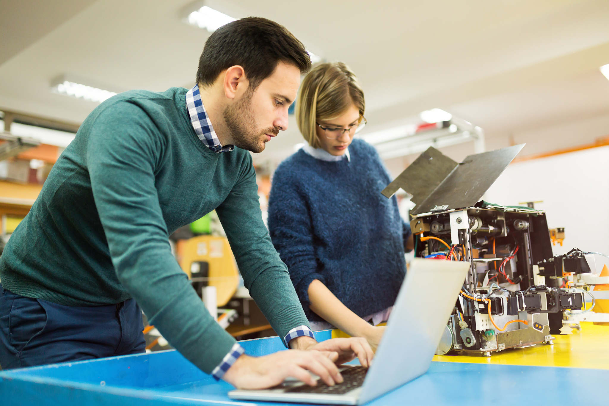robotics engineer students teamwork on project