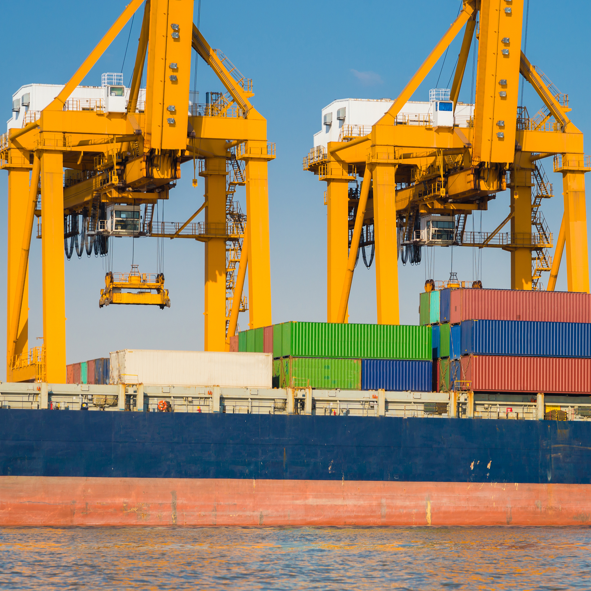 Intelligent Algorithm for Yard Crane Scheduling in Multiple Container Blocks