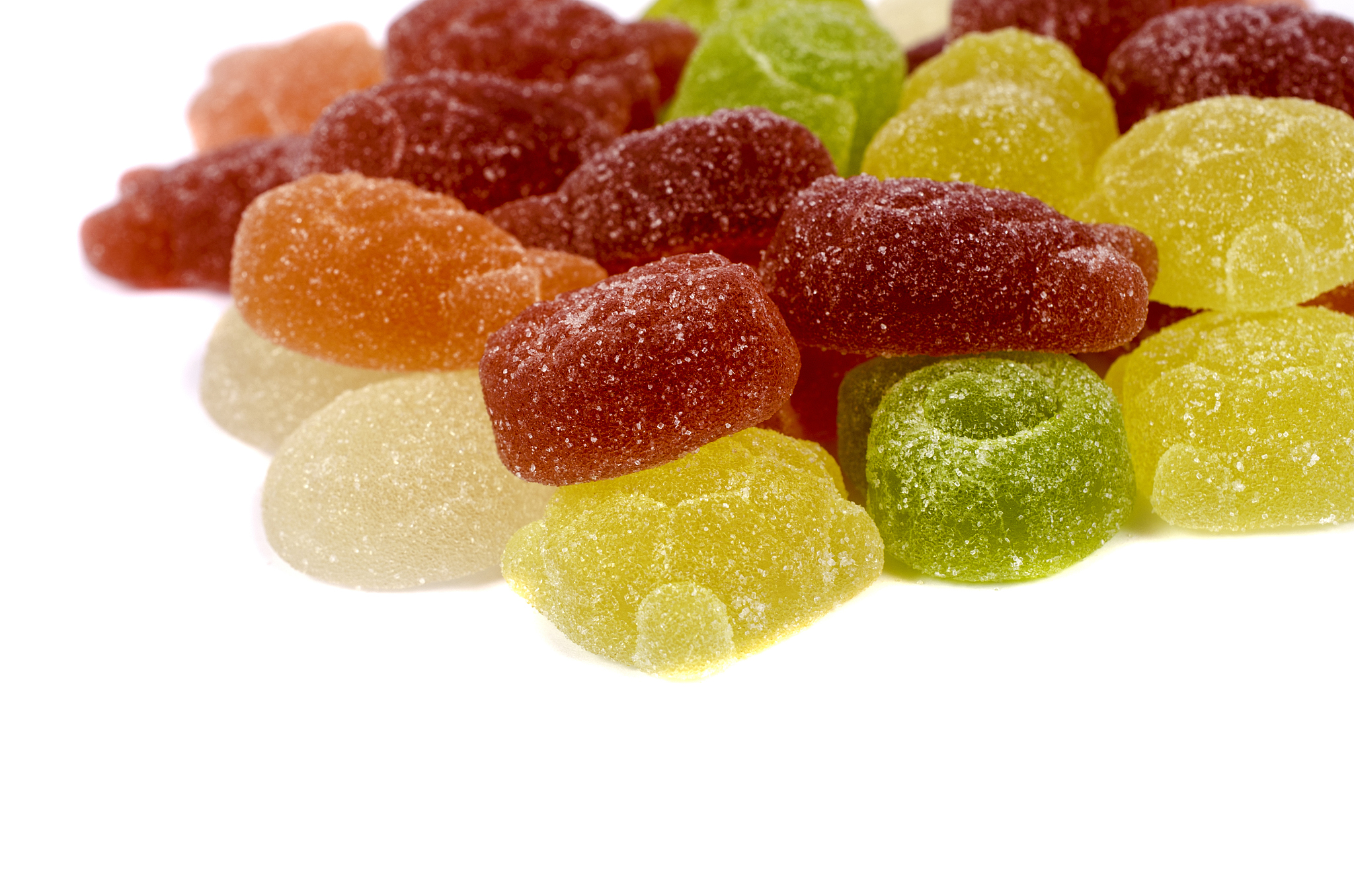 multicolored marmalade on white background.