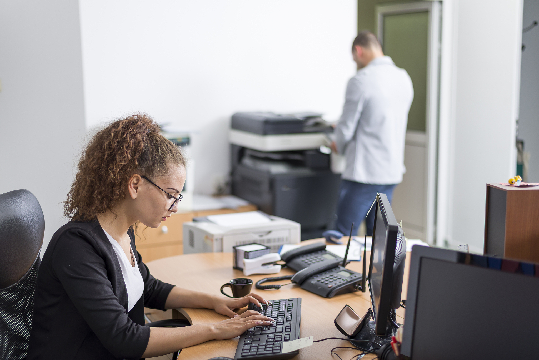 young brokers work in their office.
