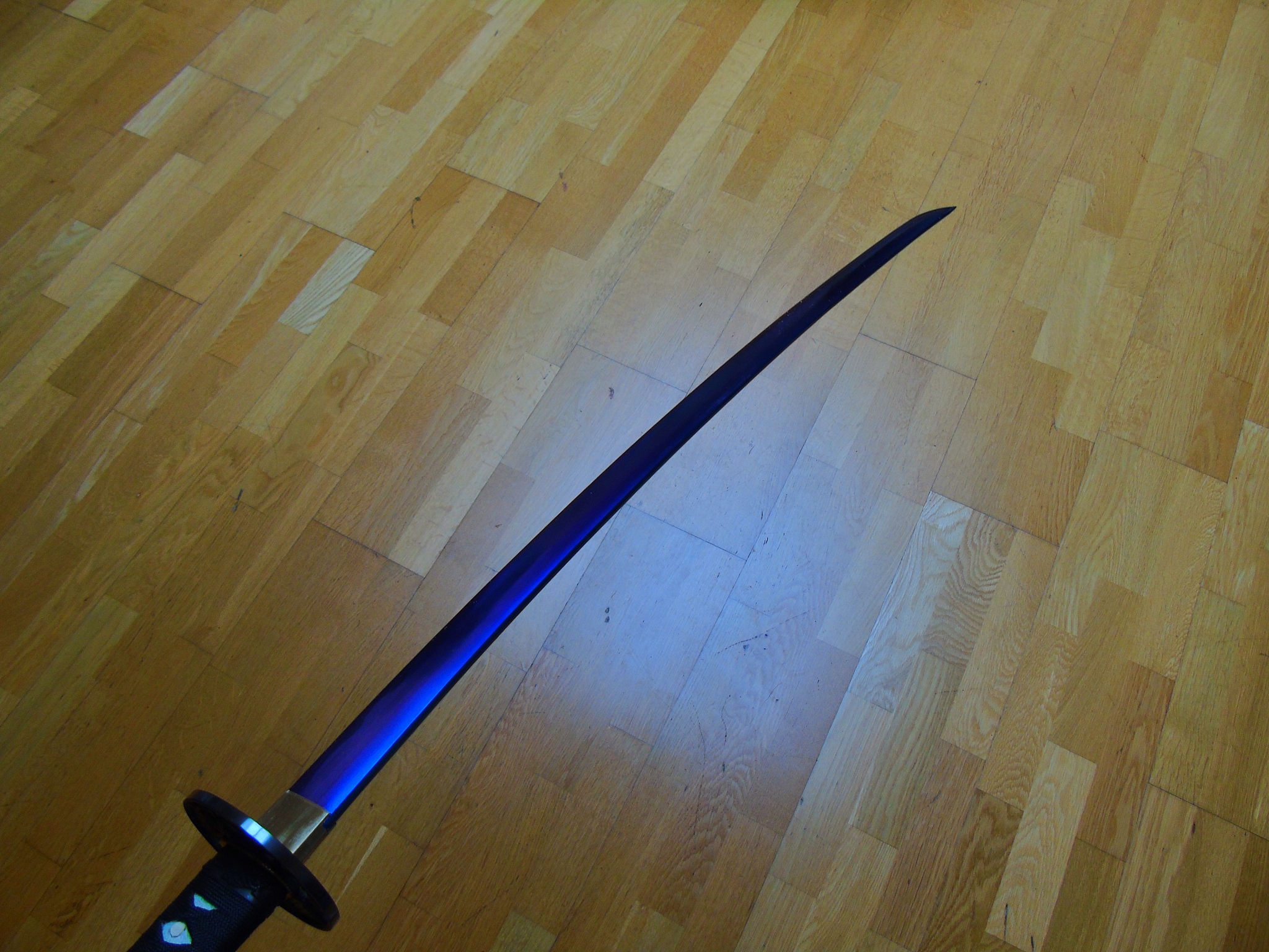 katana sword with blue blade first person perspective