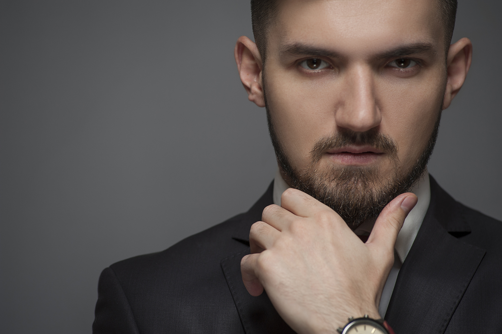 serious businessman or manager looks at the camera