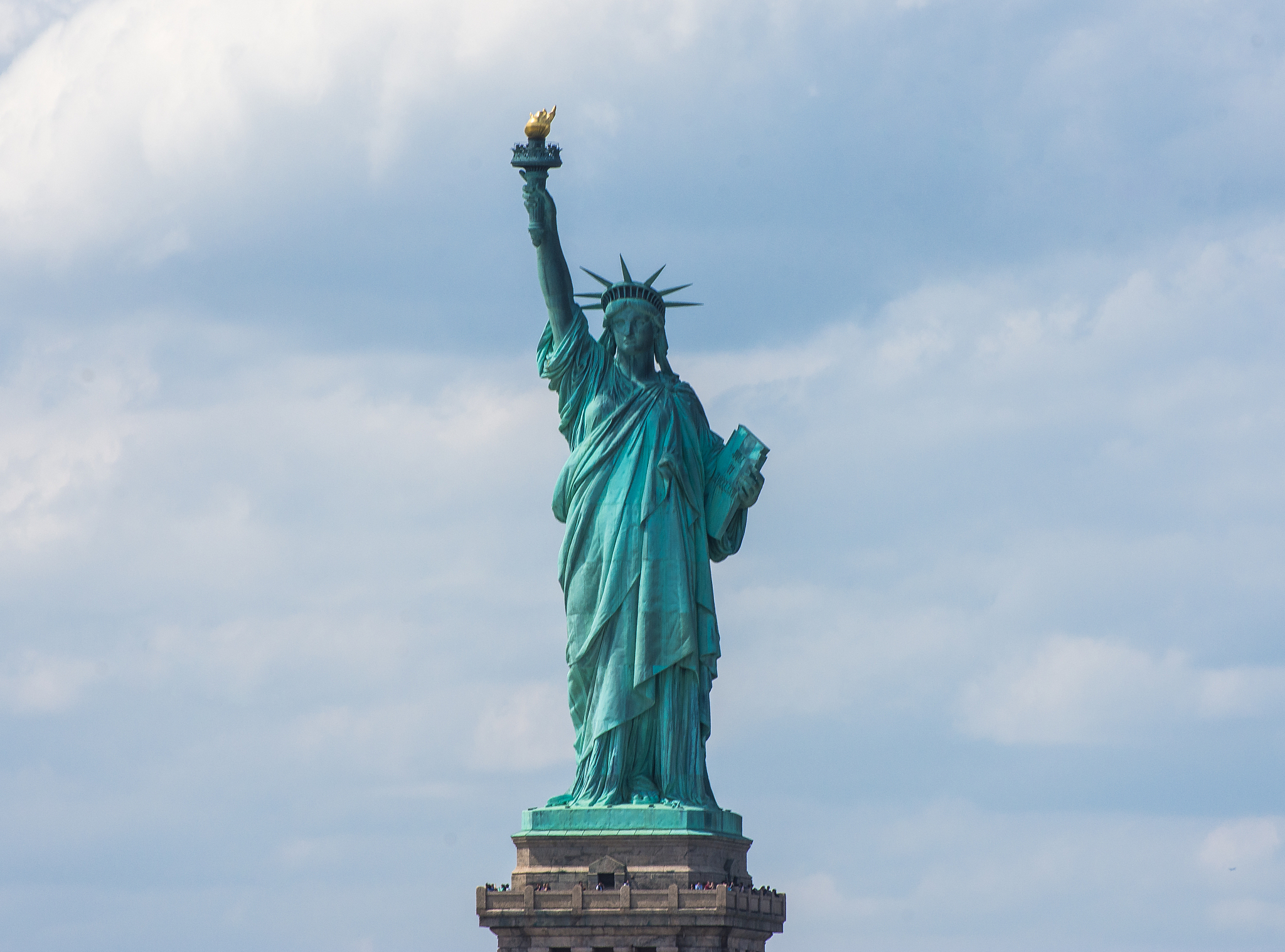 statue of liberty. new york, panorama of manhattan with the one 