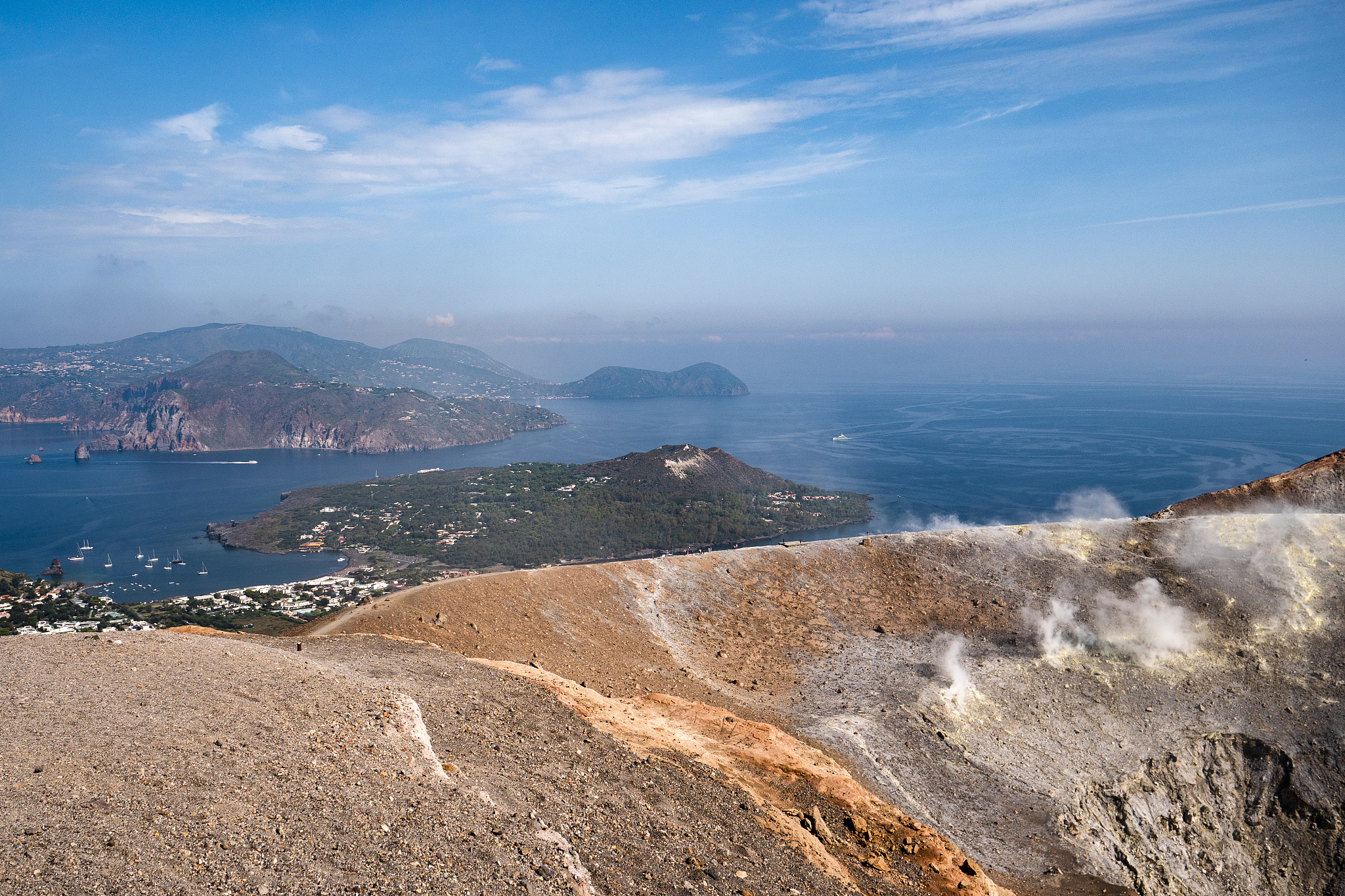 volcanic smoke coming up from the crater of vulcano island
