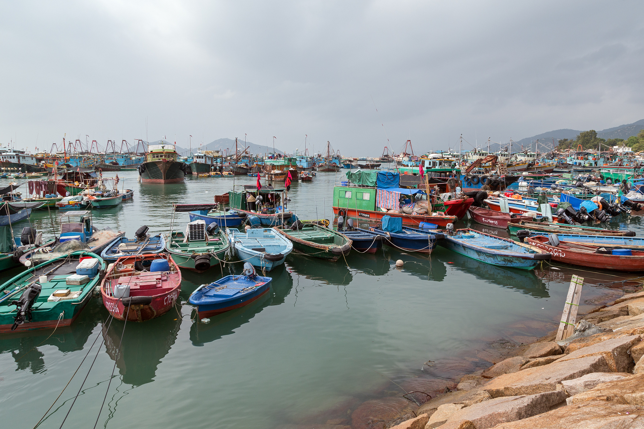 many fishing and other boats at a harbour on cheung chau island 