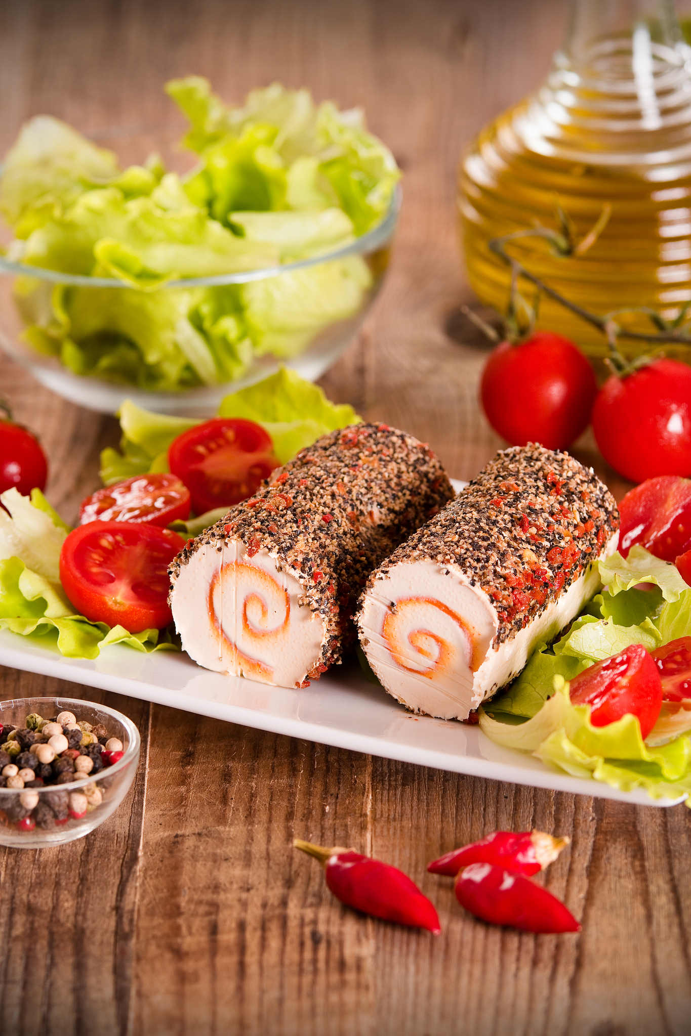 goat cheese with salad and cherry tomatoes.