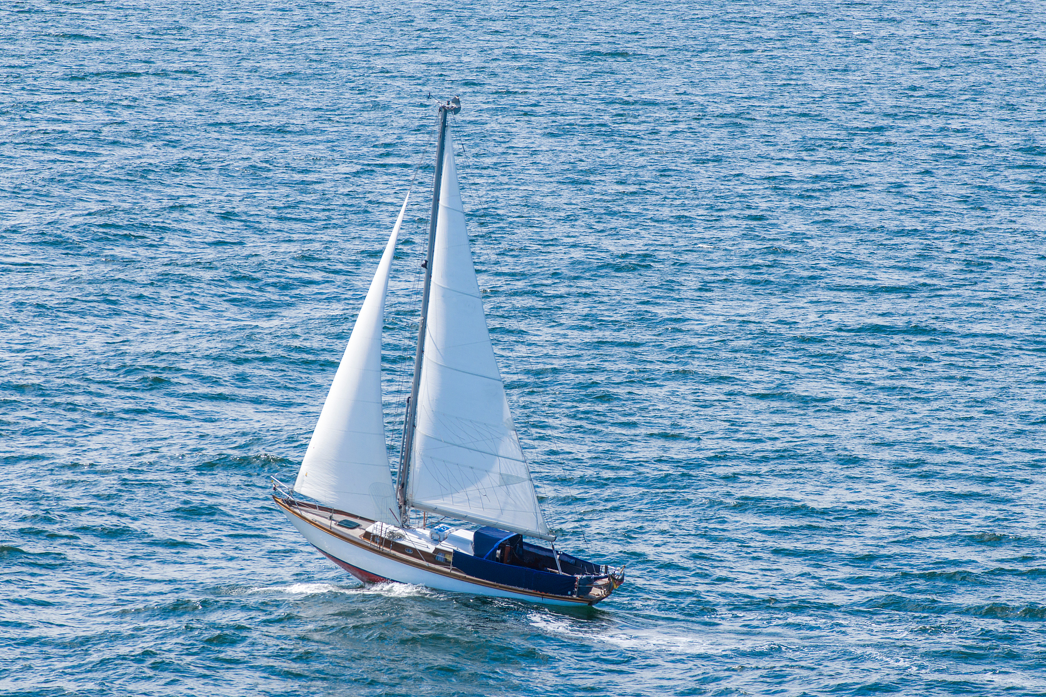 sailboat sailing on sea