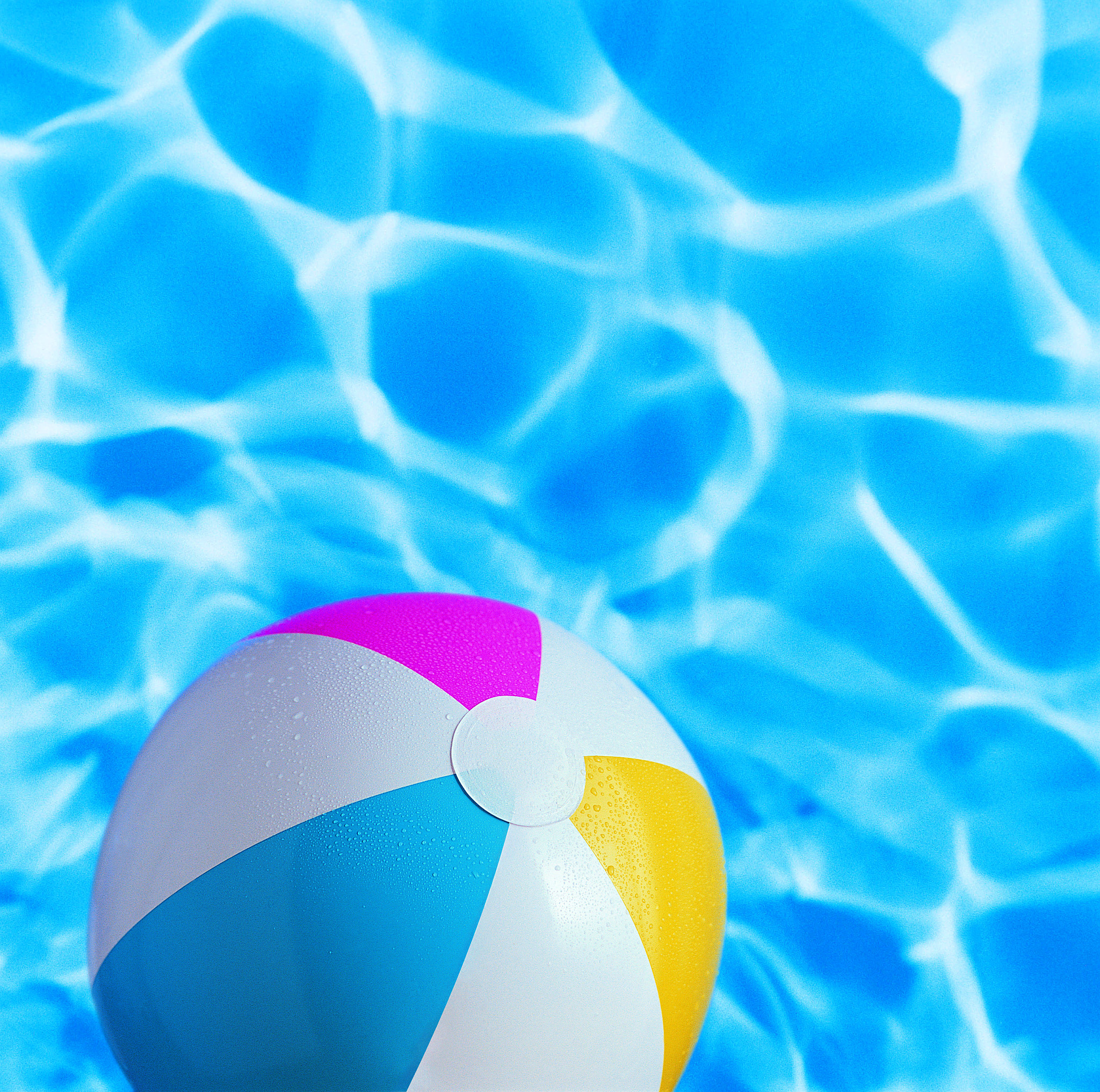 beach ball and floating in water