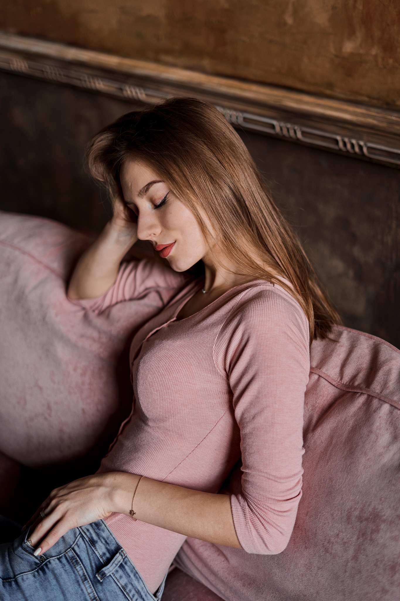 woman sleeping on bed at home